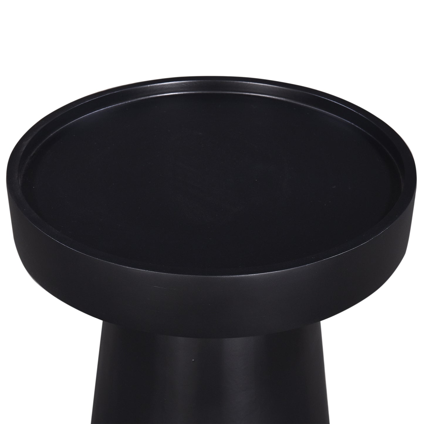 Sleek black accent table with a round minimalist design for modern living spaces