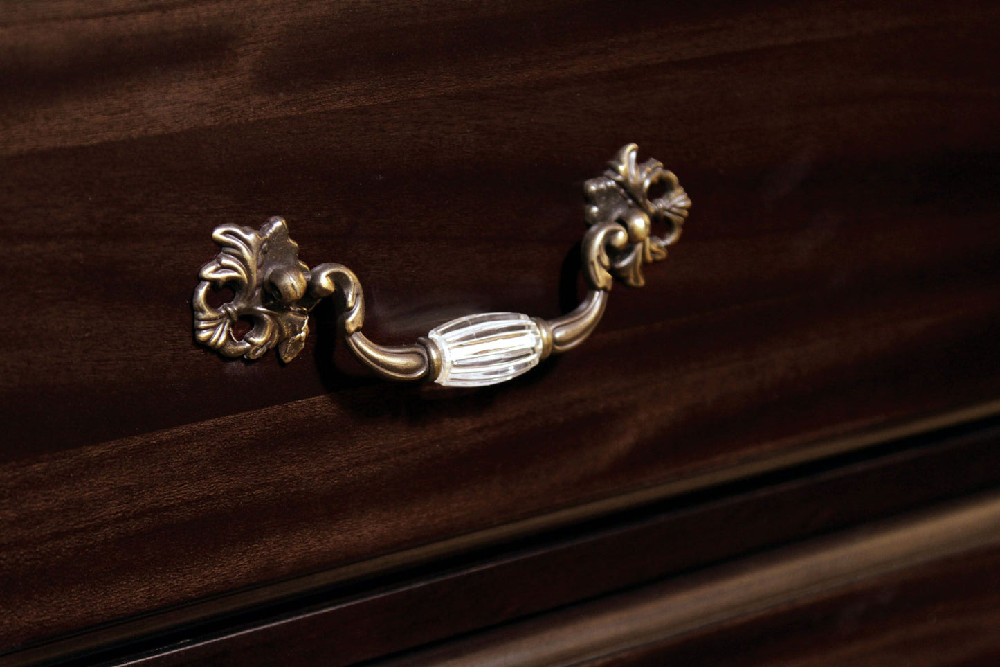 Antique brass ornate dresser pull with clear glass accent