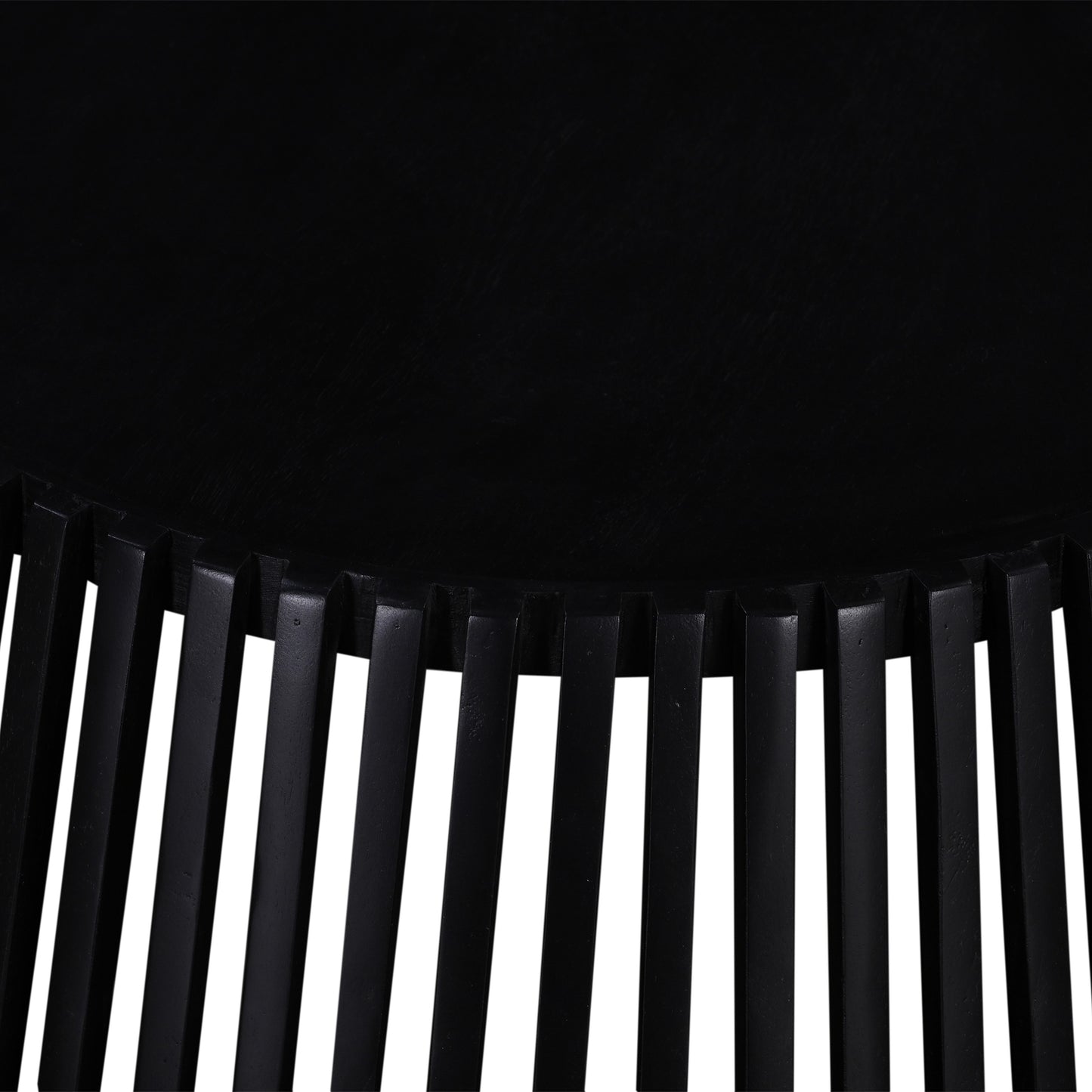 Textured black metal accent table with ribbed base design modern living room piece