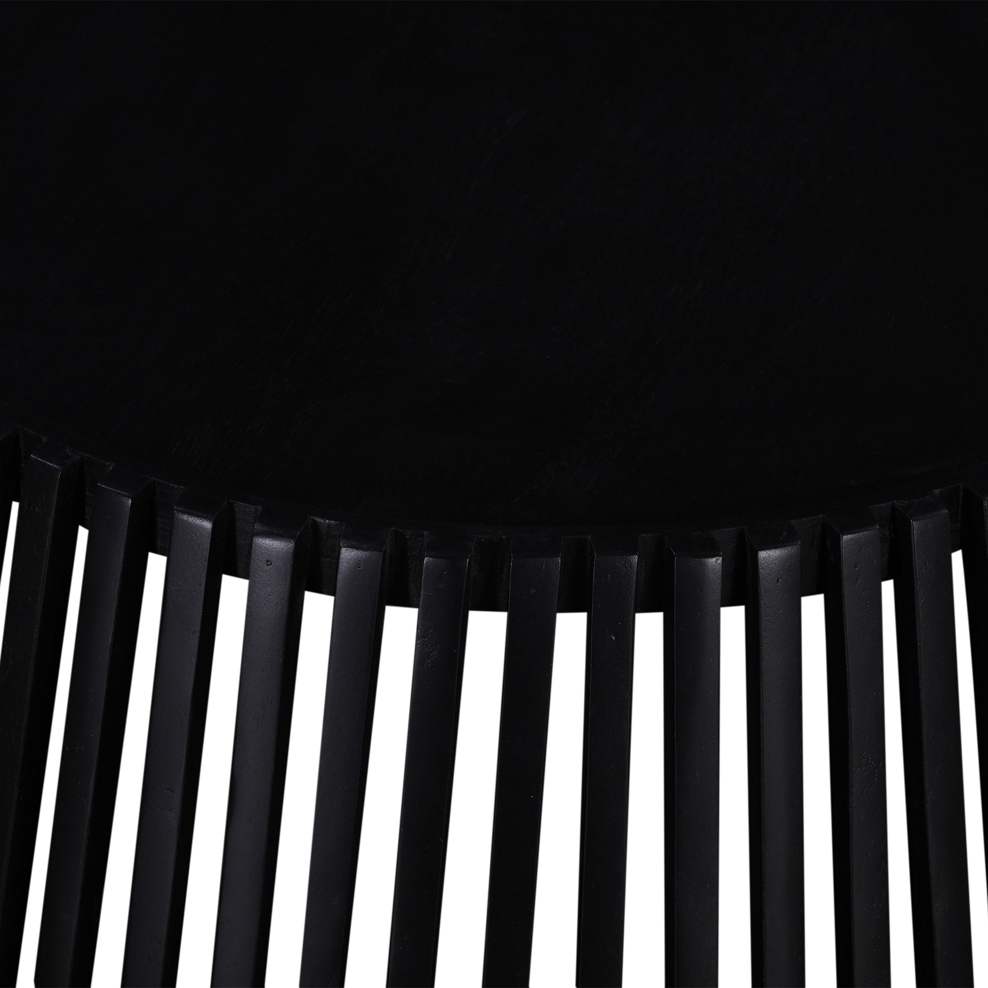 Textured black metal accent table with ribbed base design modern living room piece