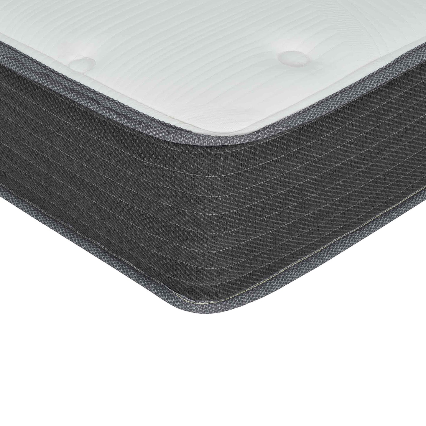 Closeup of a white quilted mattress with dark grey patterned side fabric for comfortable sleep