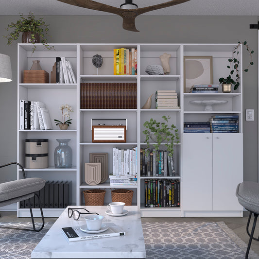 Modern white bookshelf with diverse book arrangement and decor