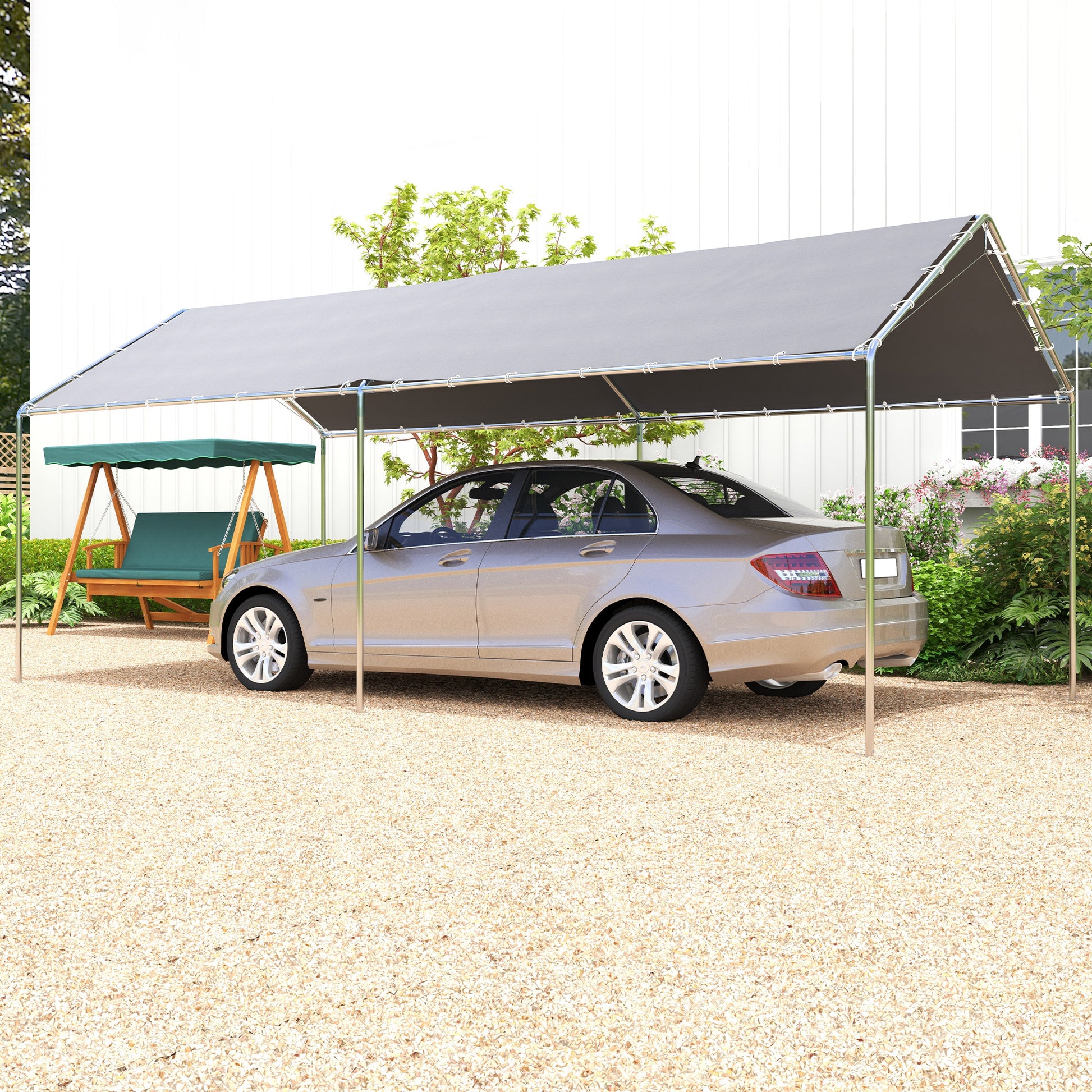 Gray steel frame carport protecting a beige sedan from elements