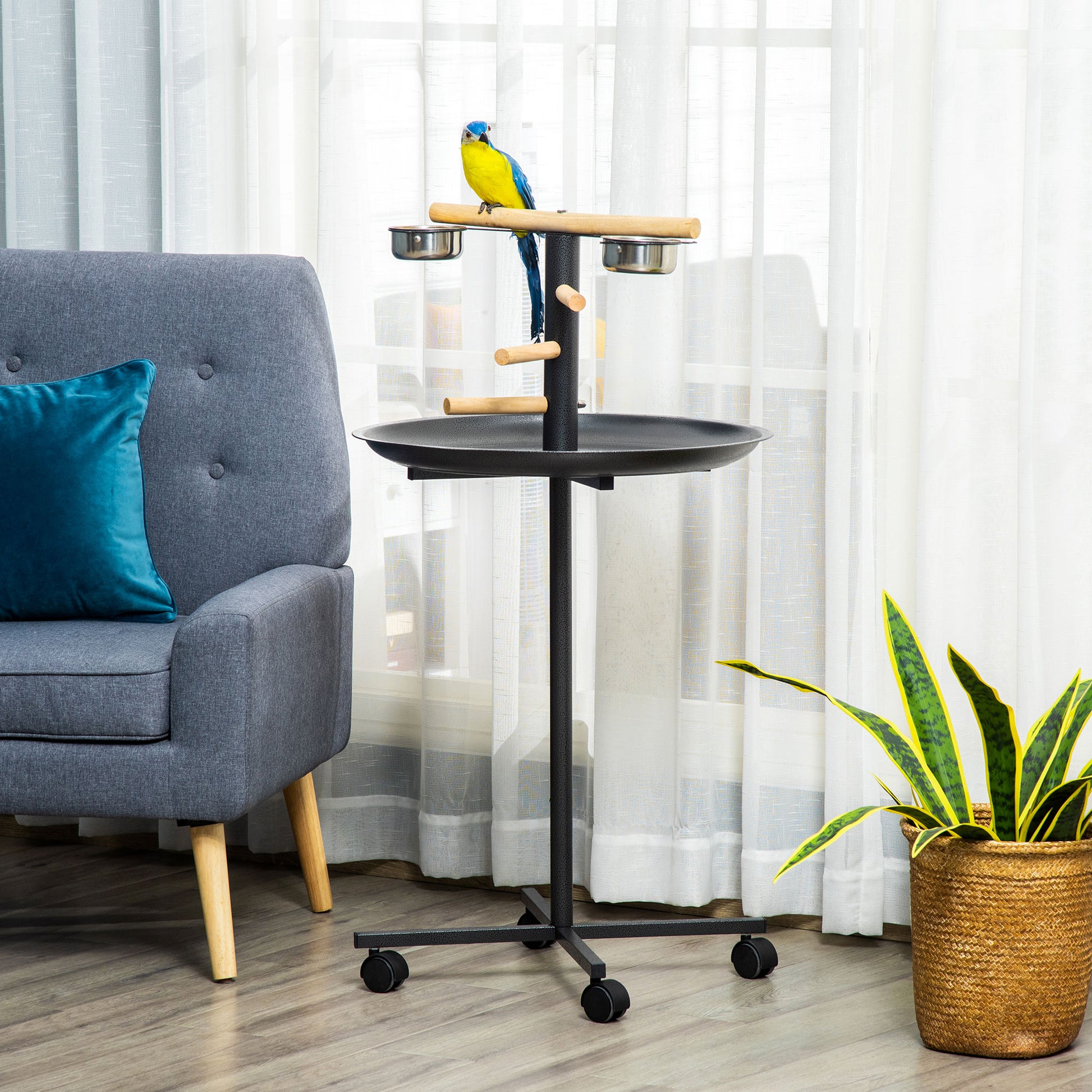 This portable bird stand features adjustable perches and feeding cups for parrot comfort