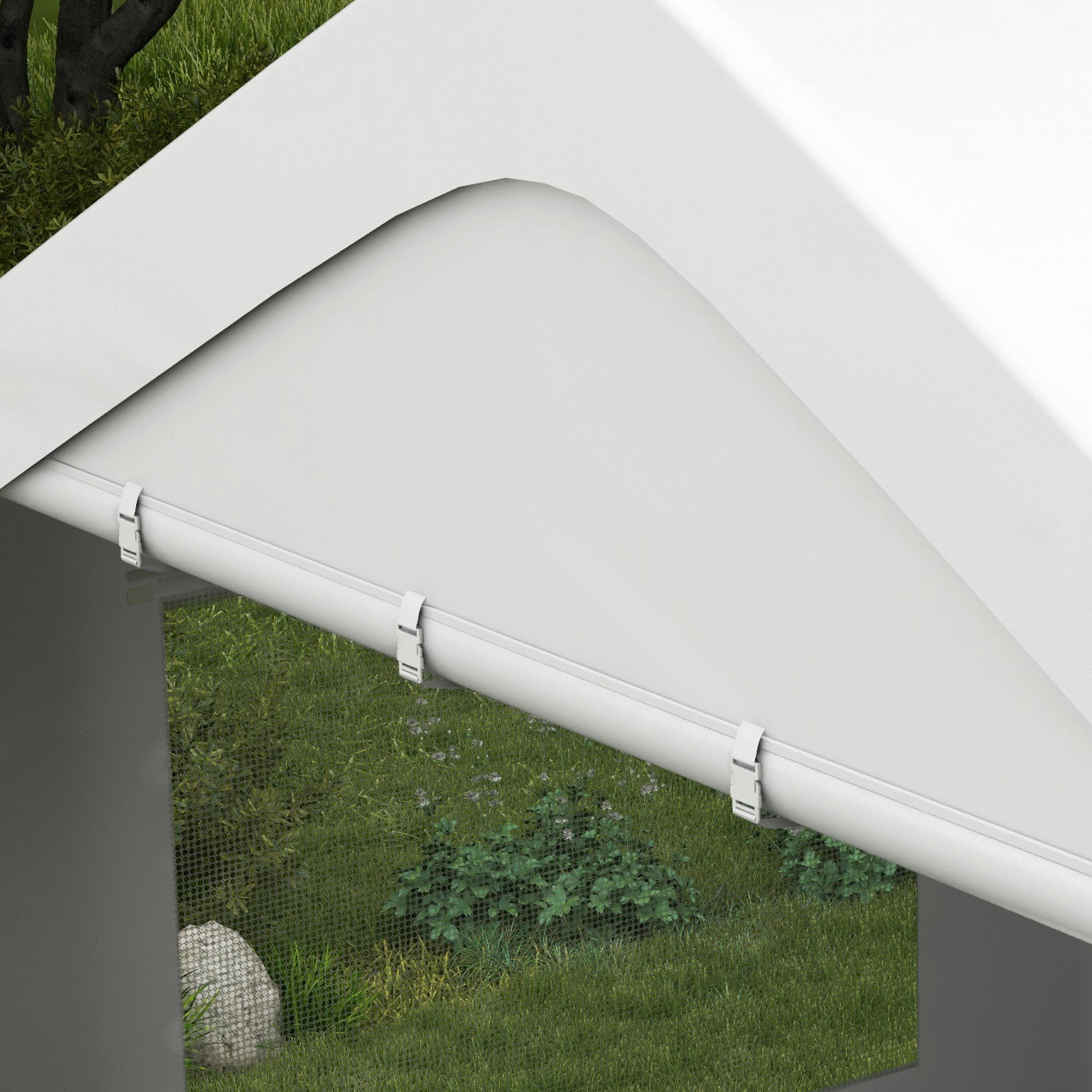White fabric awning with silver clips over a grassy yard and bushes
