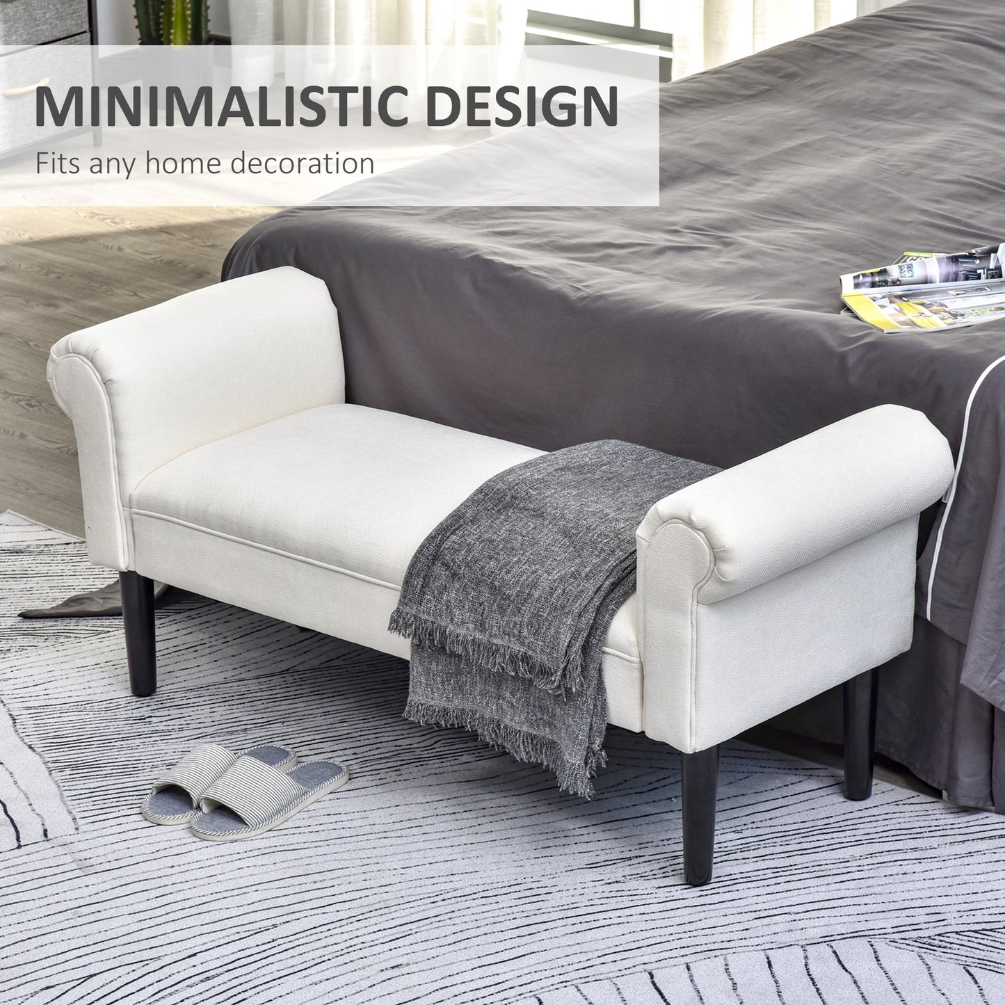 Upholstered linen bench in offwhite with rolled arms and black legs for a bedroom accent