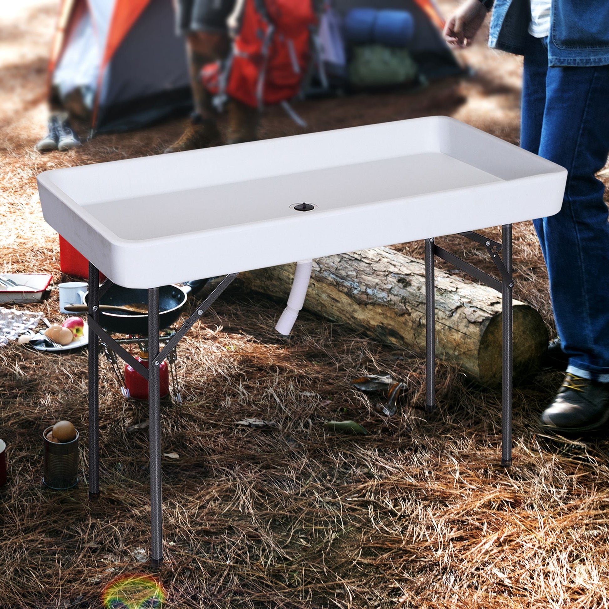 White portable camping sink with folding legs ideal for outdoor kitchens