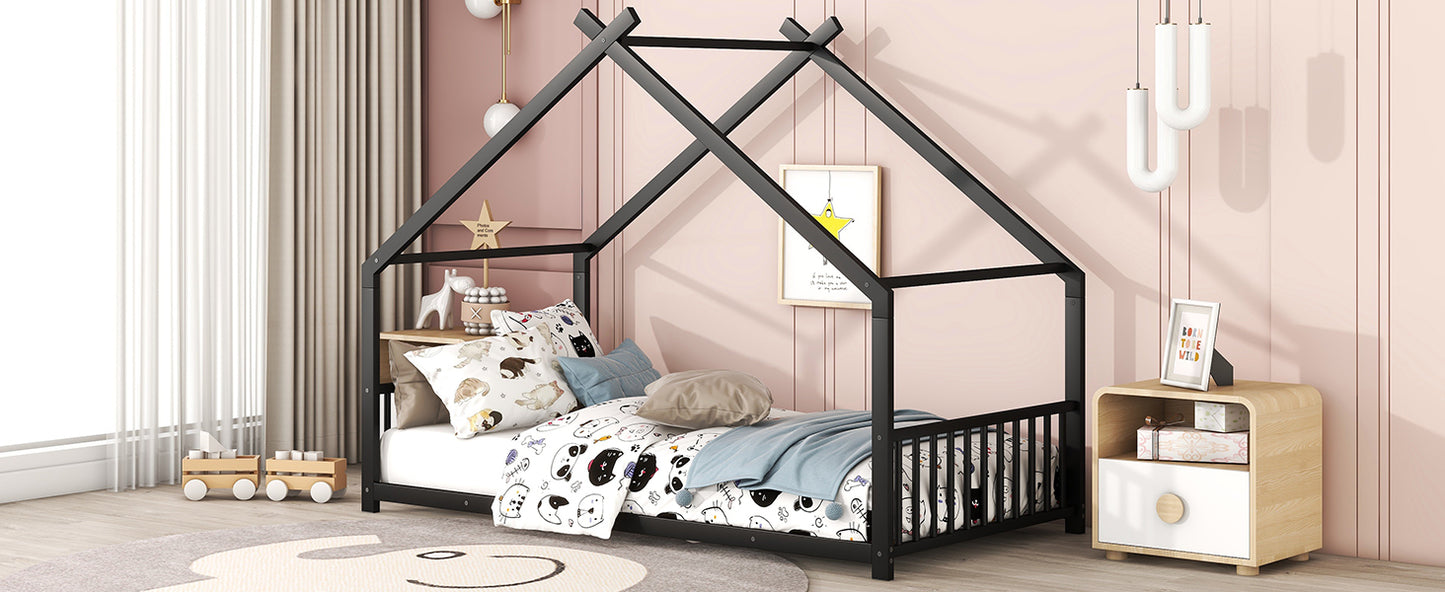 Black metal house bed frame with playful catthemed bedding and pillows