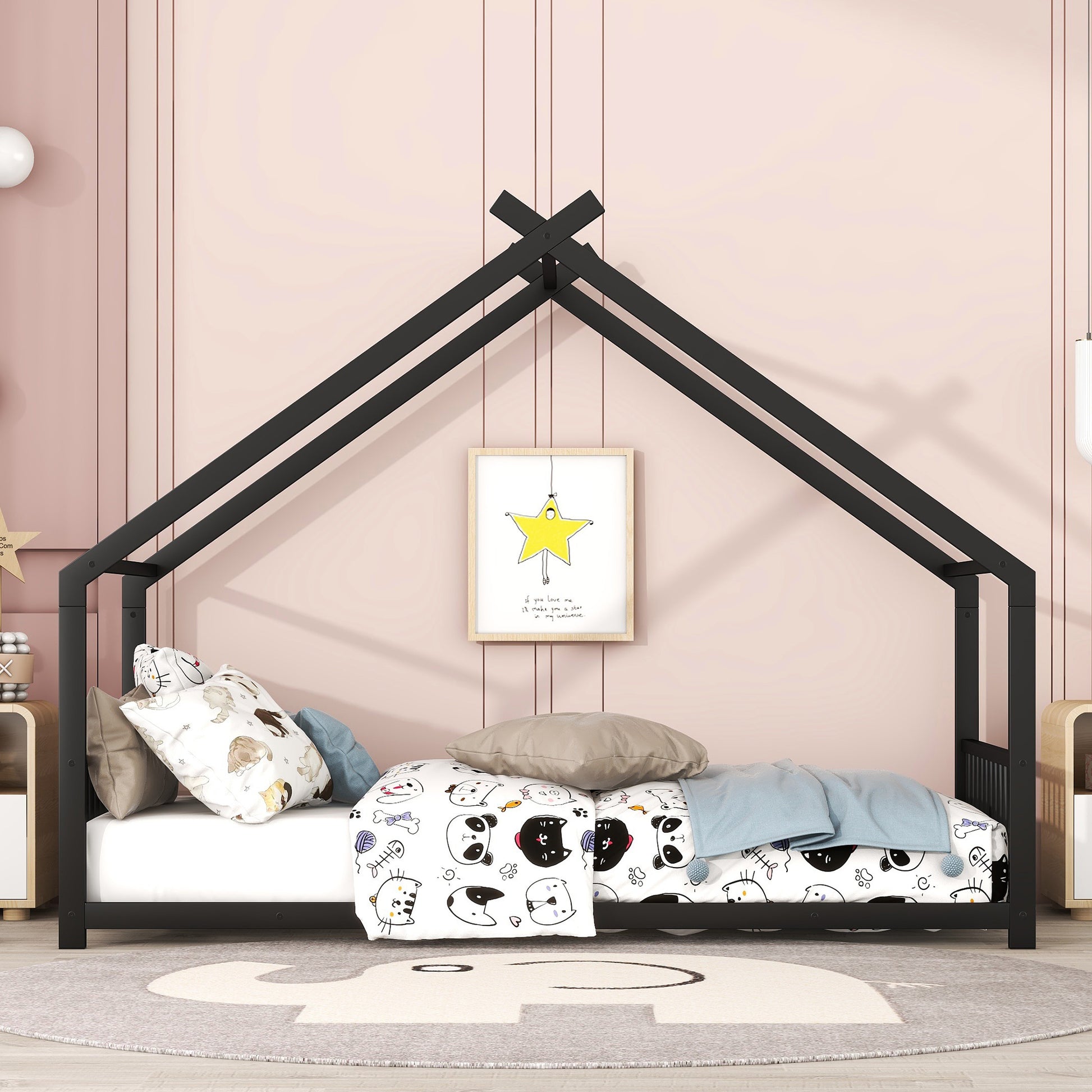 Black metal house frame twin bed with playful catthemed bedding