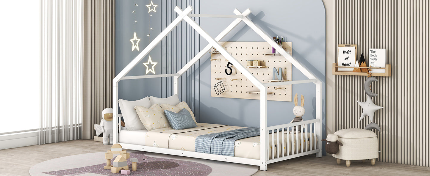 White wooden house bed frame for kids with playful bedding and star decor