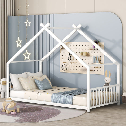 White wooden house bed frame with playful bedding and stuffed animals