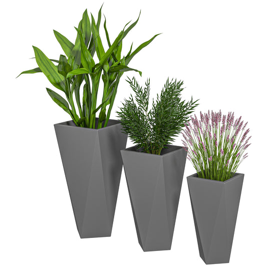 Set of  geometric grey planters with a tall green plant bamboo and lavender