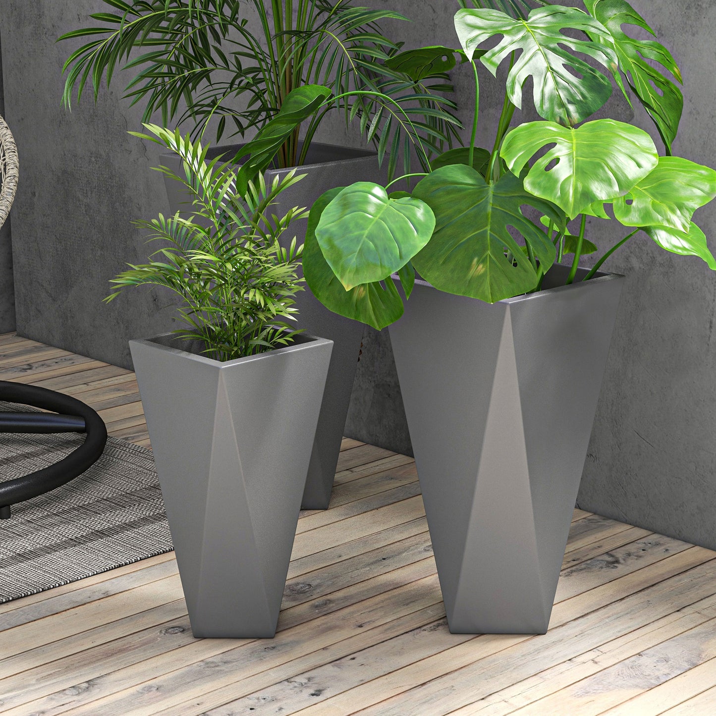 Tall grey geometric planter with lush green monstera plant for modern decor