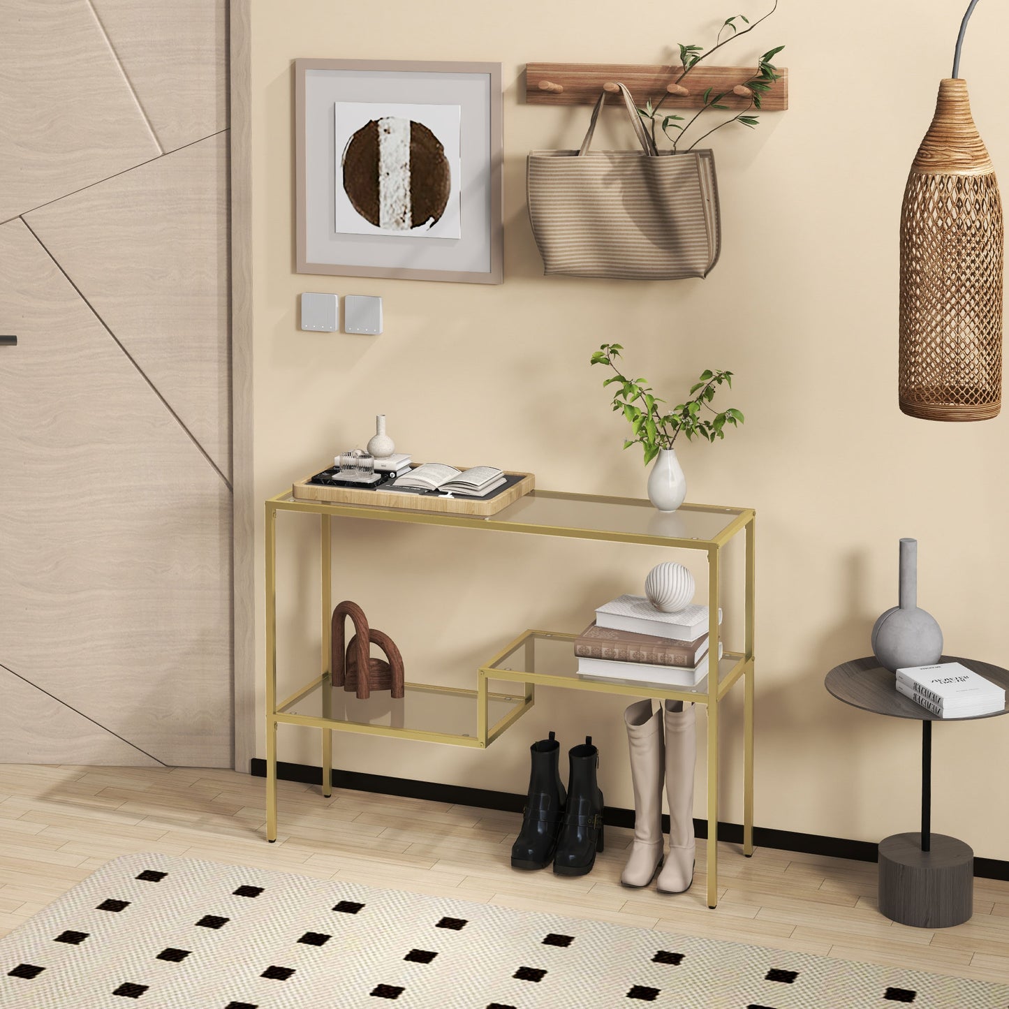 Gold metal console table with glass shelves holding decor and boots