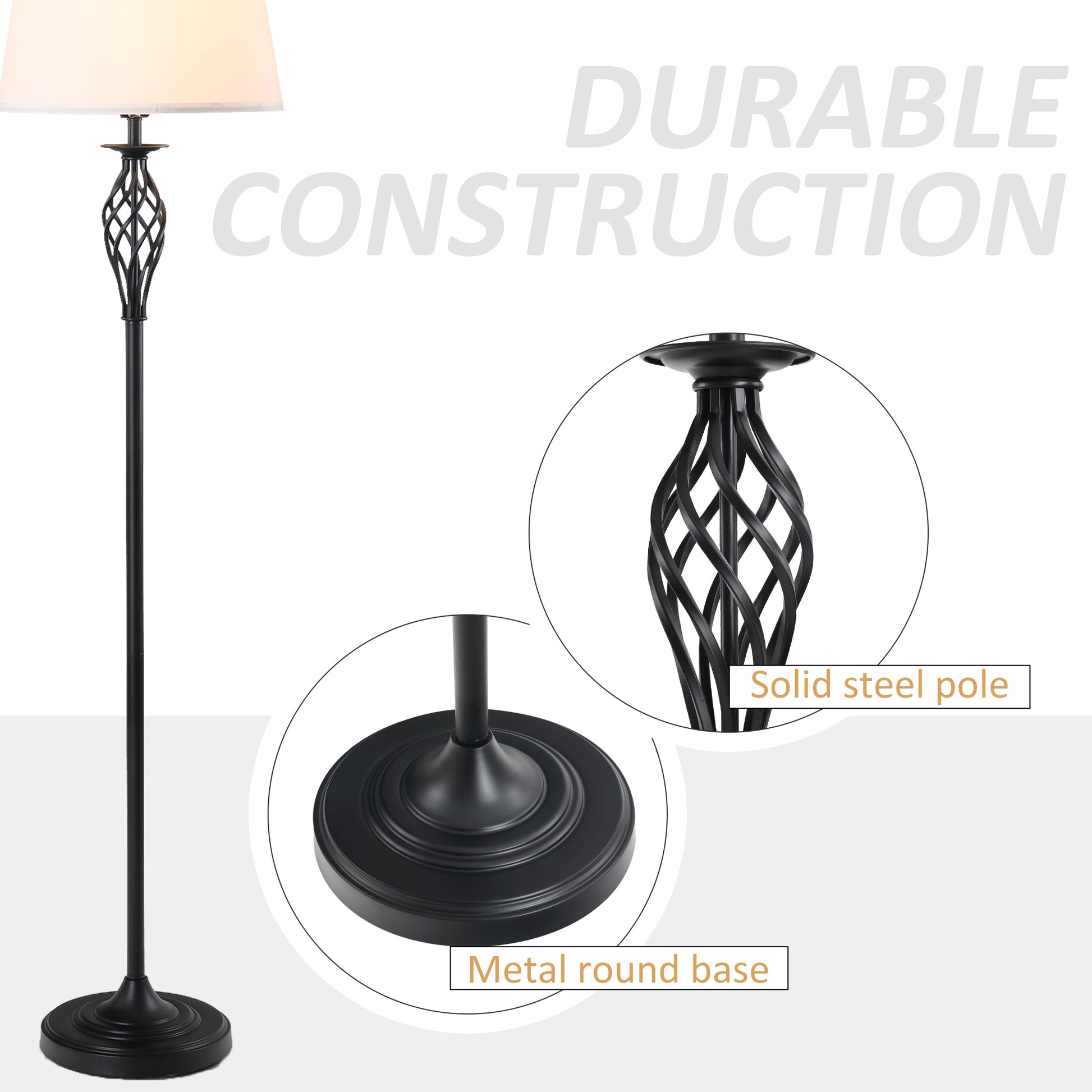 Black metal floor lamp with ornate twisted pole and cream shade