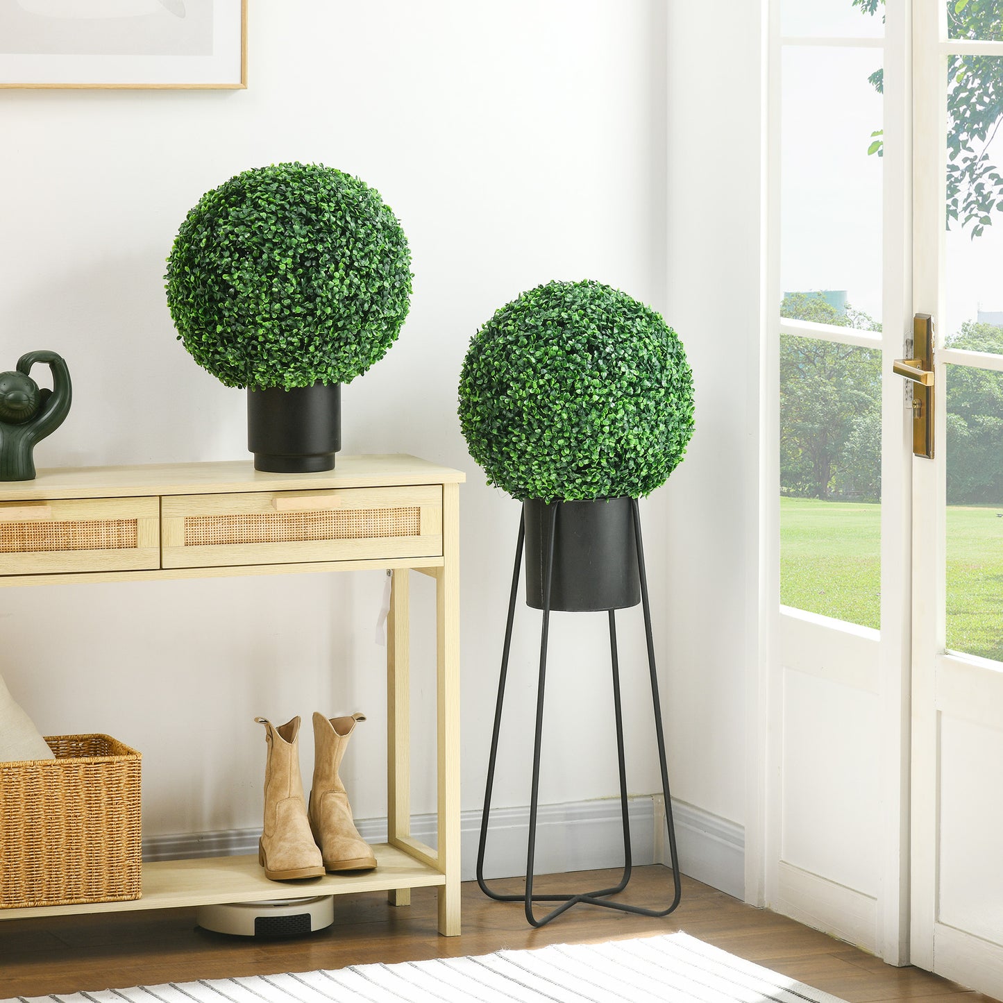 Realistic artificial boxwood topiary ball in a black planter for home decor