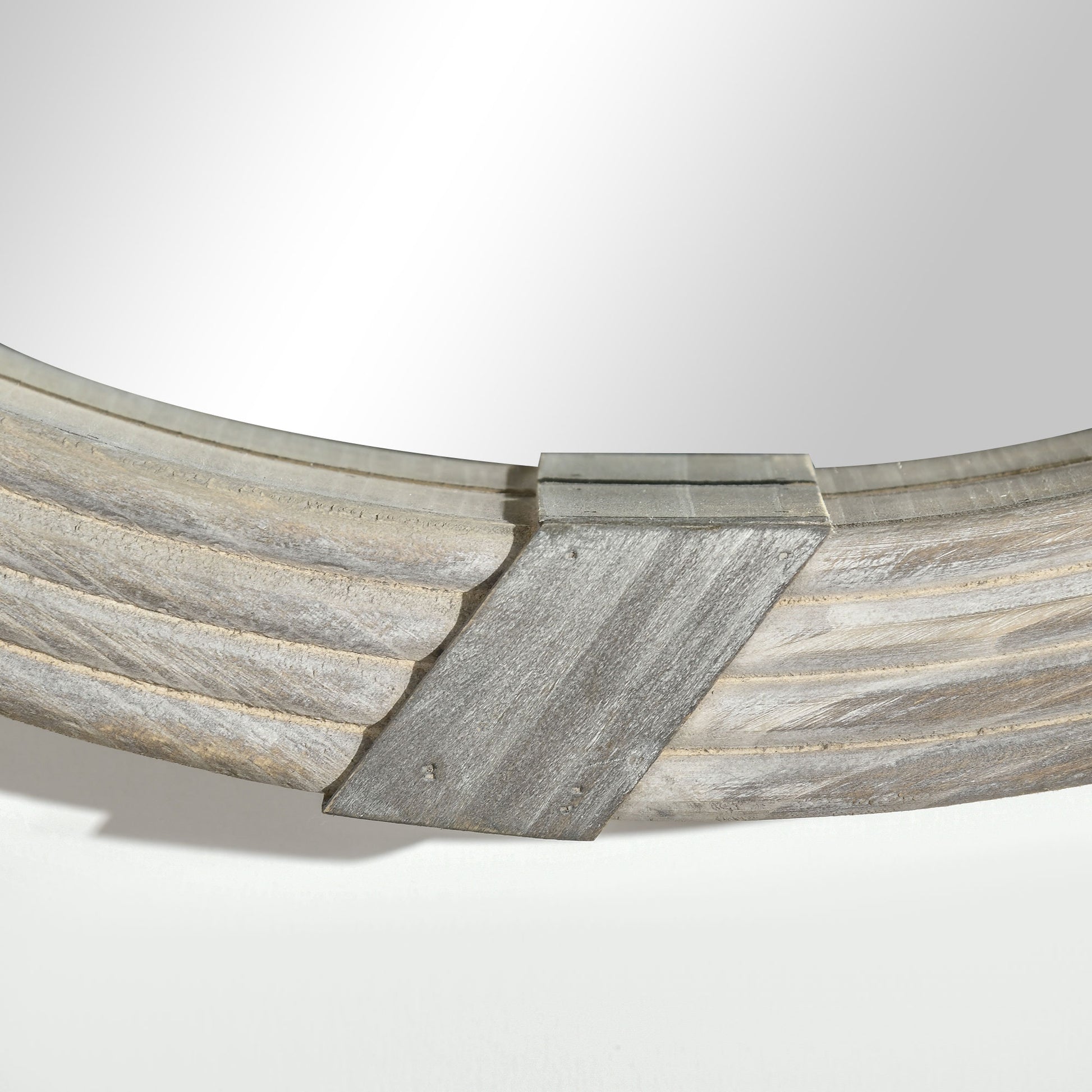 Textured grey wood round mirror frame with metal accent