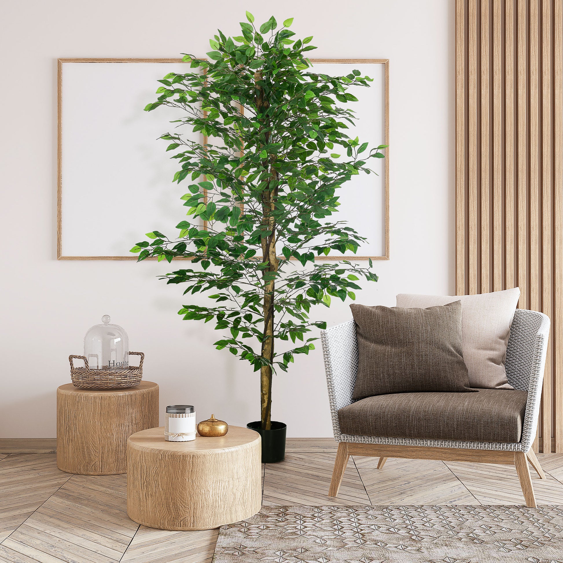 Tall artificial ficus tree with dense green leaves in a black pot