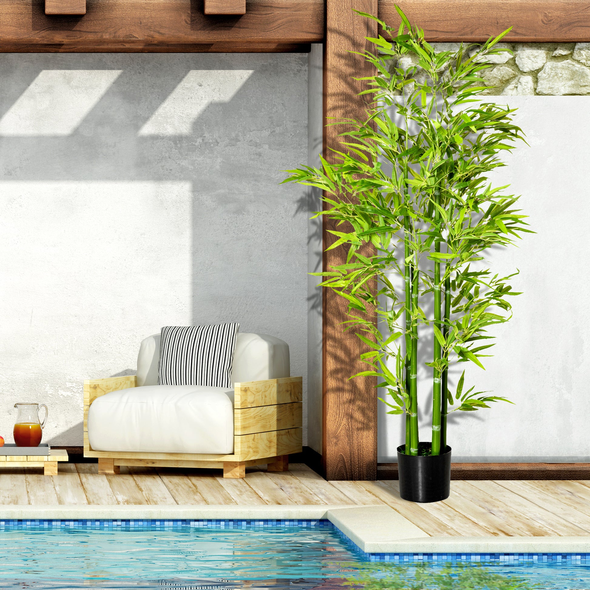 Tall artificial bamboo plant in a black pot perfect for outdoor patio decor