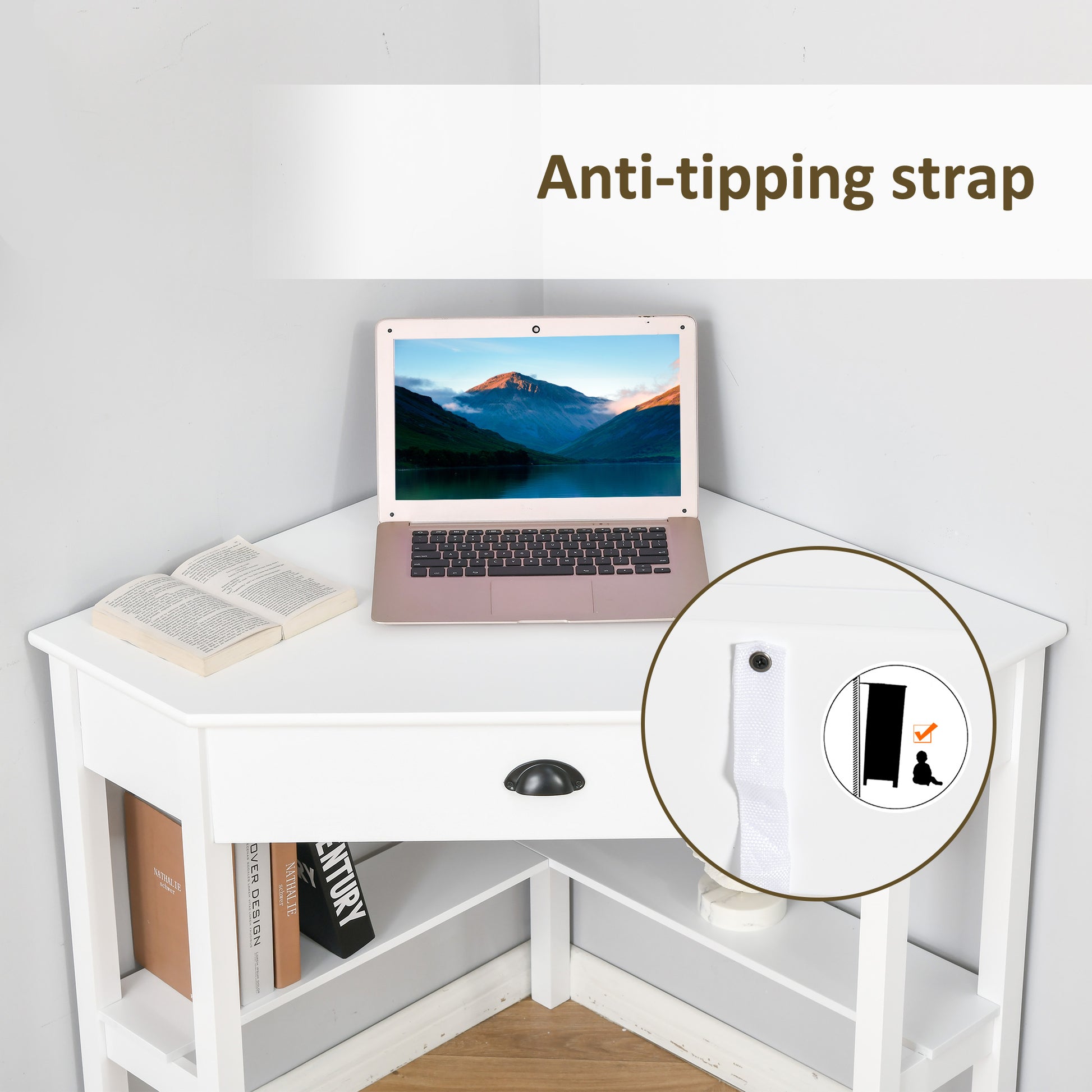 White corner desk with a laptop open book and antitipping strap