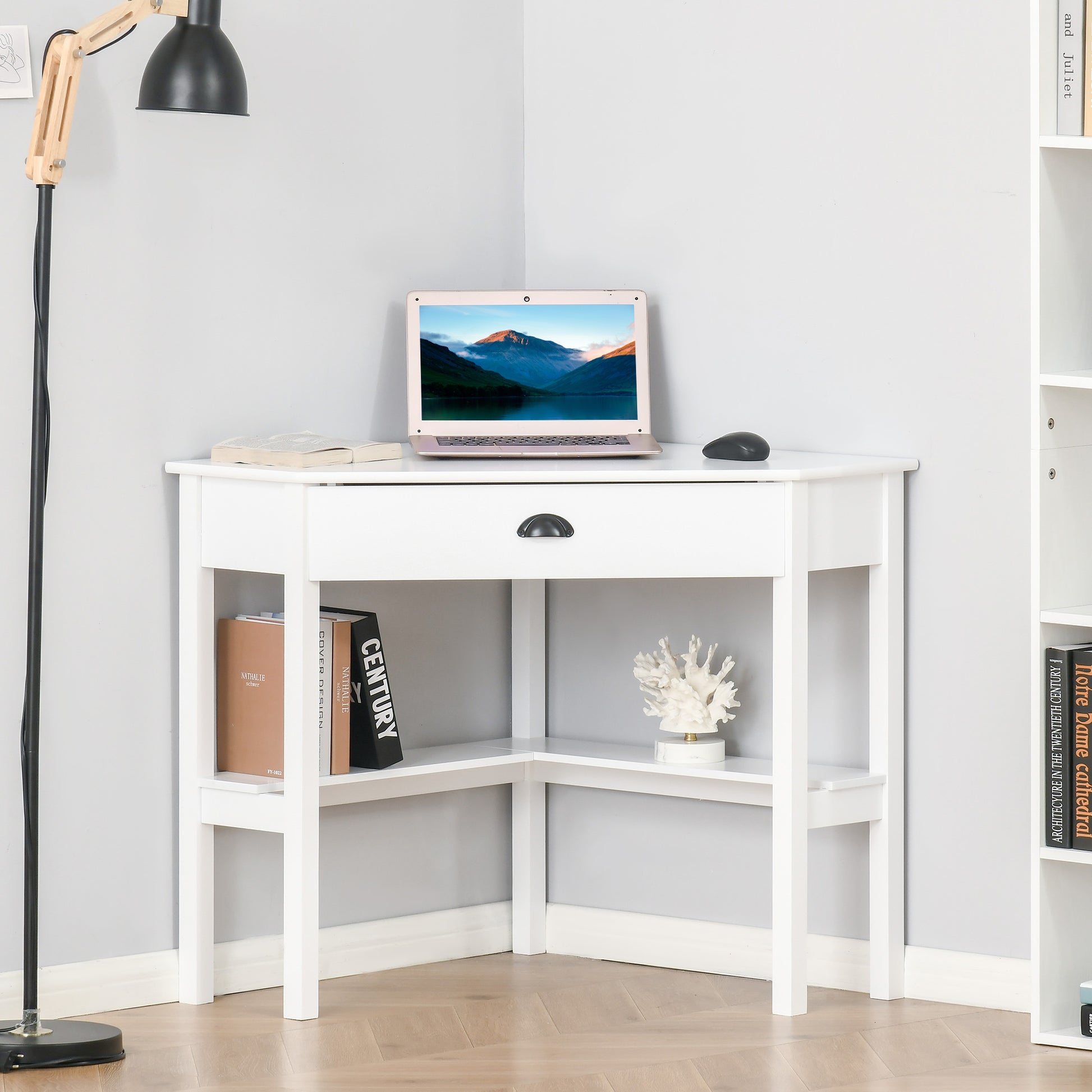 White corner desk with open shelves and a drawer ideal for small spaces