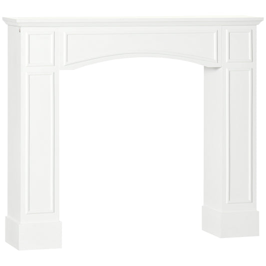 White arched fireplace mantel with detailed molding and classic paneled sides