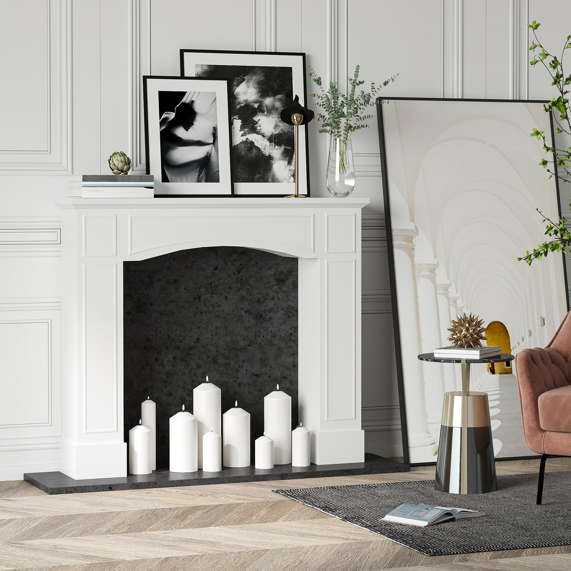 White pillar candles arranged on a modern fireplace hearth