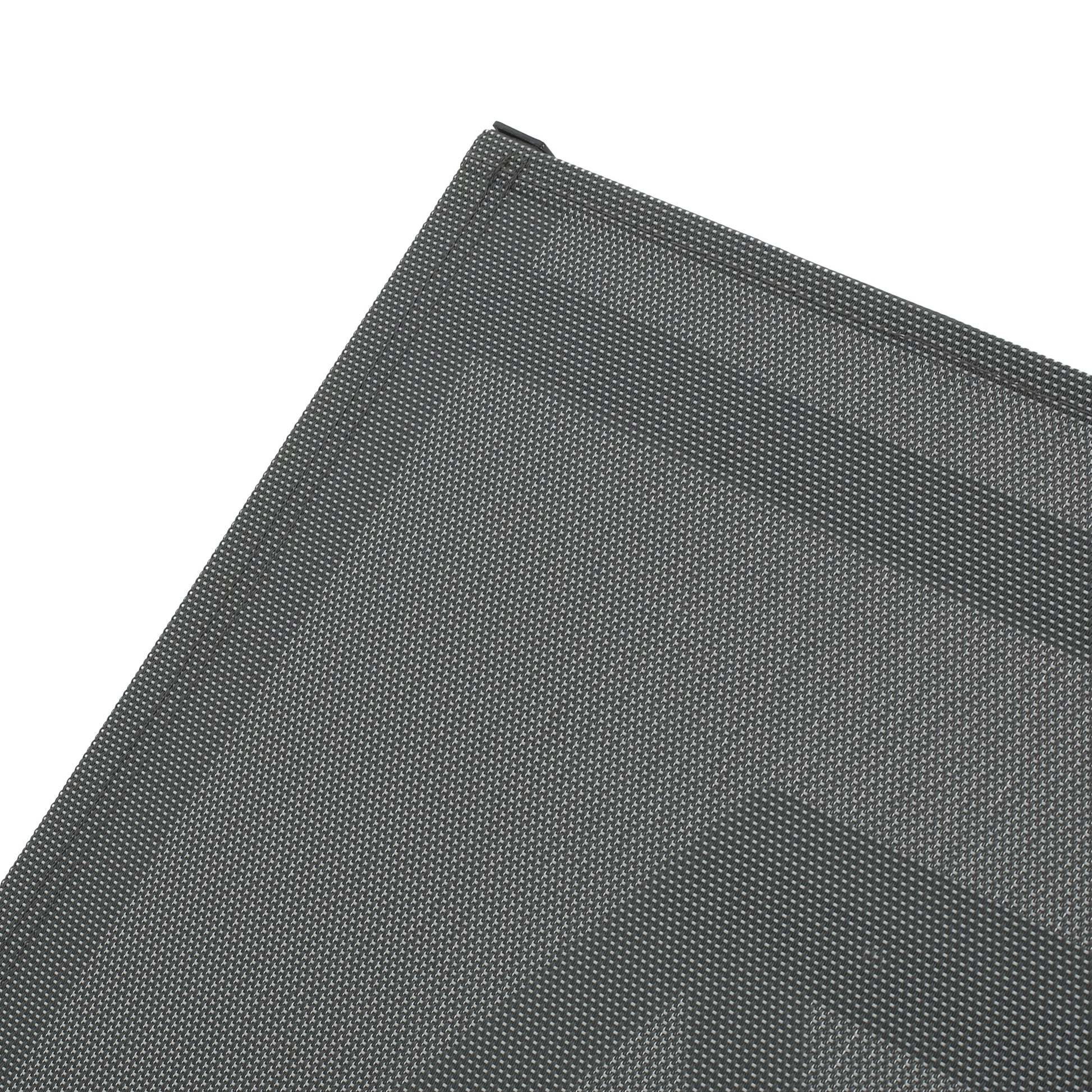 Closeup of dark gray textured woven material with a fine houndstooth pattern