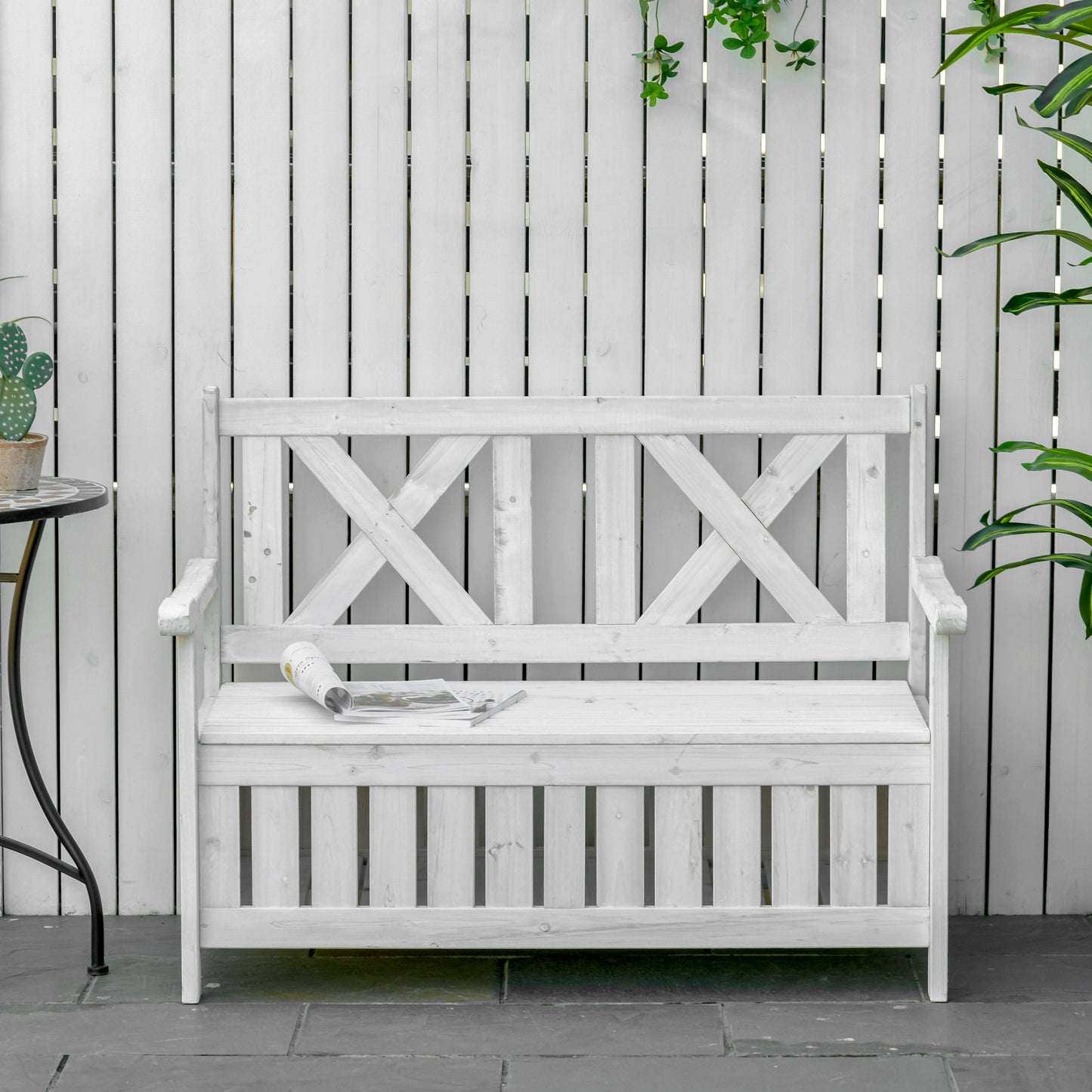White wooden storage bench with Xback detail perfect for garden seating