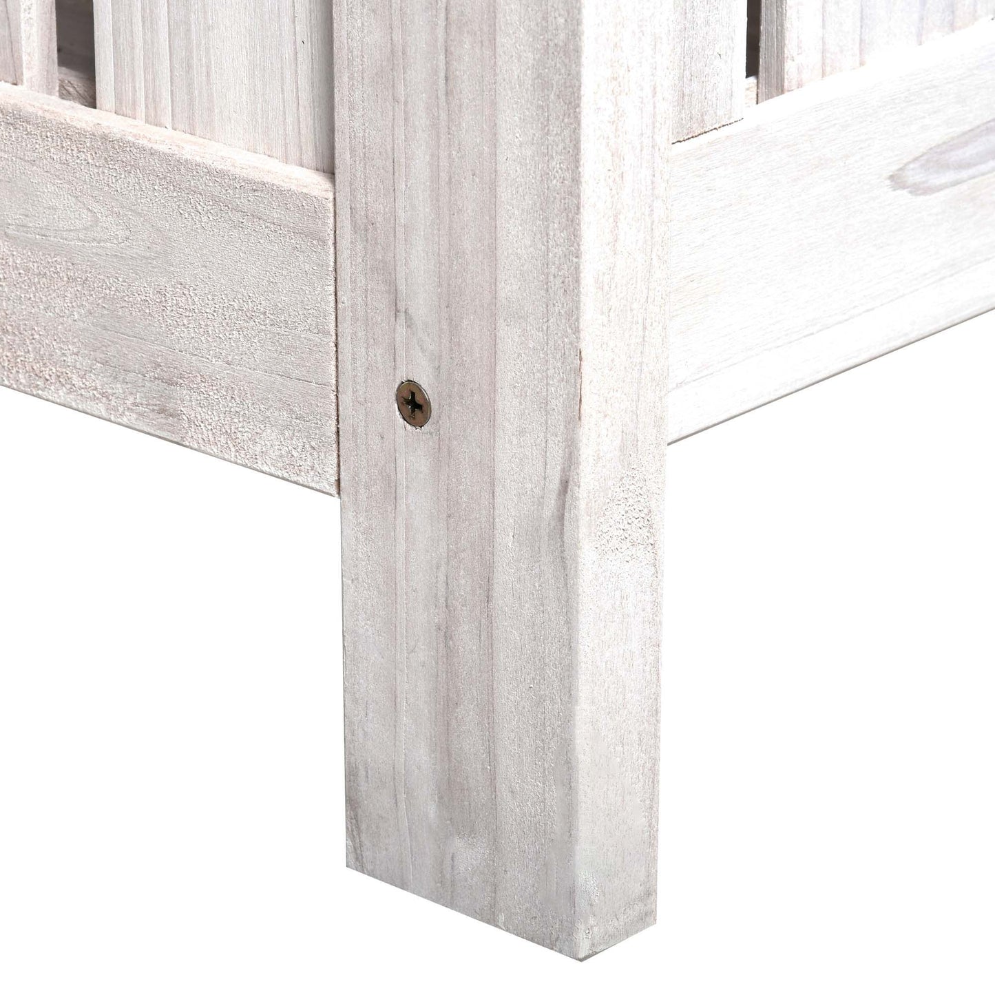 Whitewashed wood bench corner detail with visible grain and screw