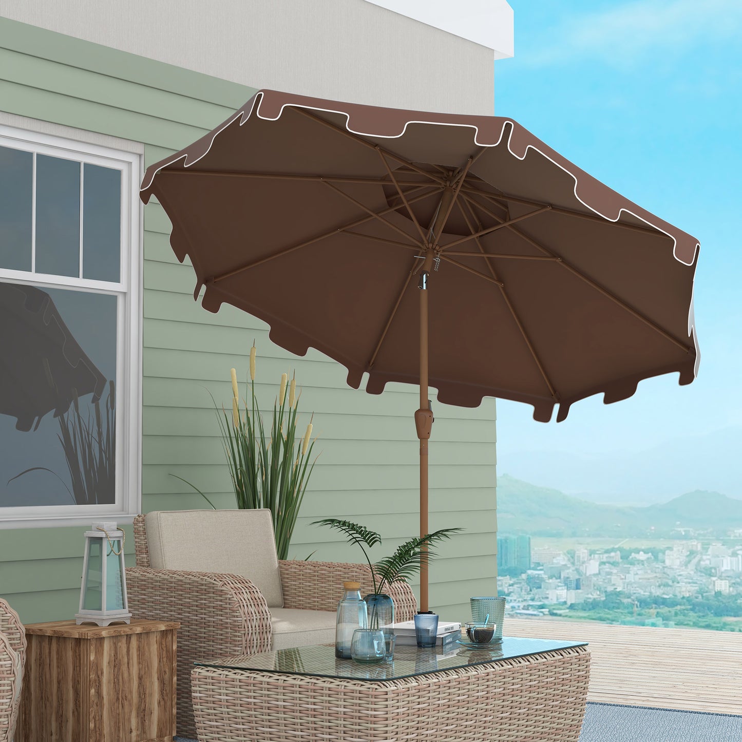 Brown patio umbrella with white scalloped trim providing shade on a deck