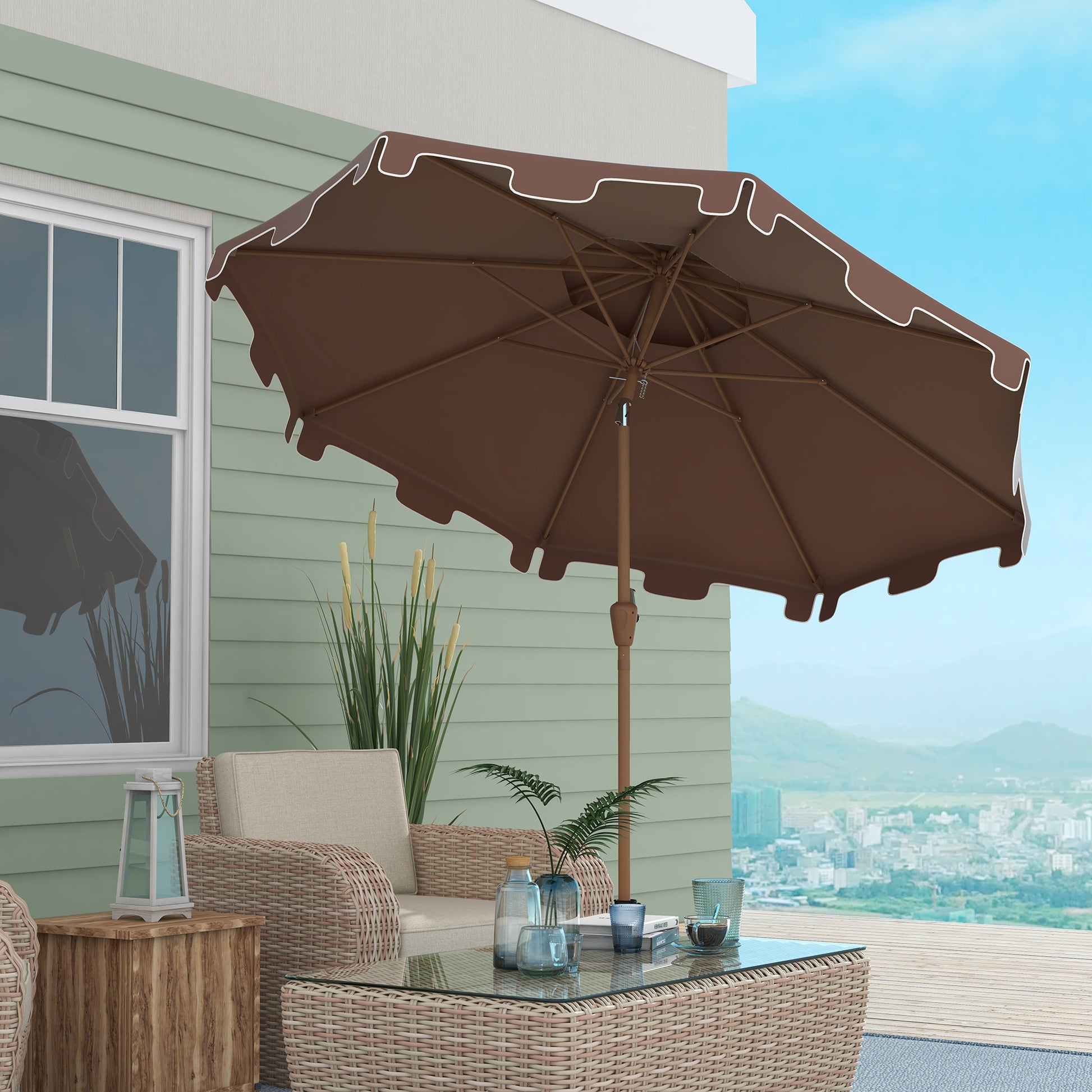 Brown patio umbrella with white scalloped trim providing shade on a deck