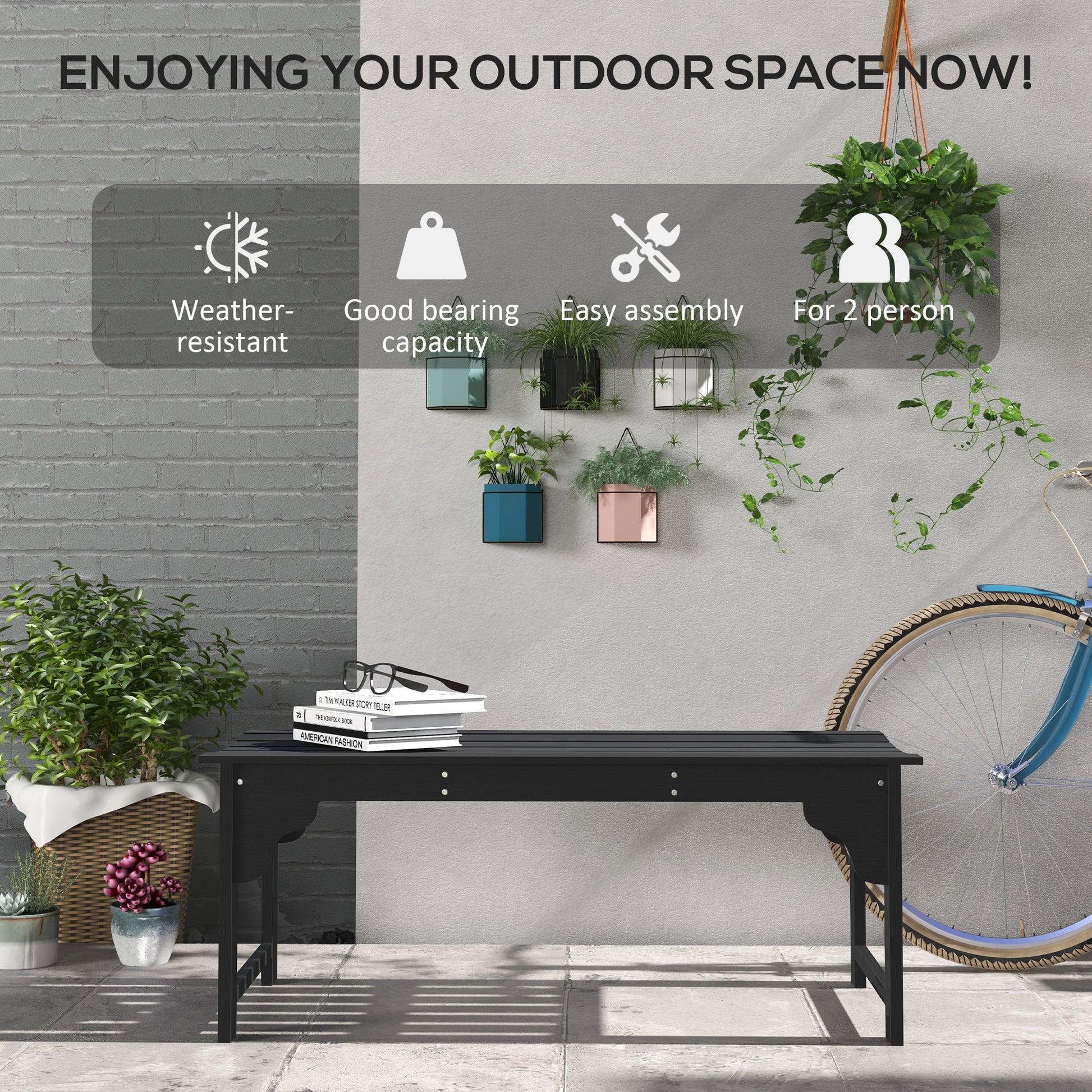 Black outdoor bench with decorative legs perfect for patio seating