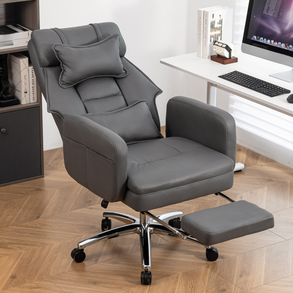 Dark grey ergonomic office chair with lumbar support and footrest