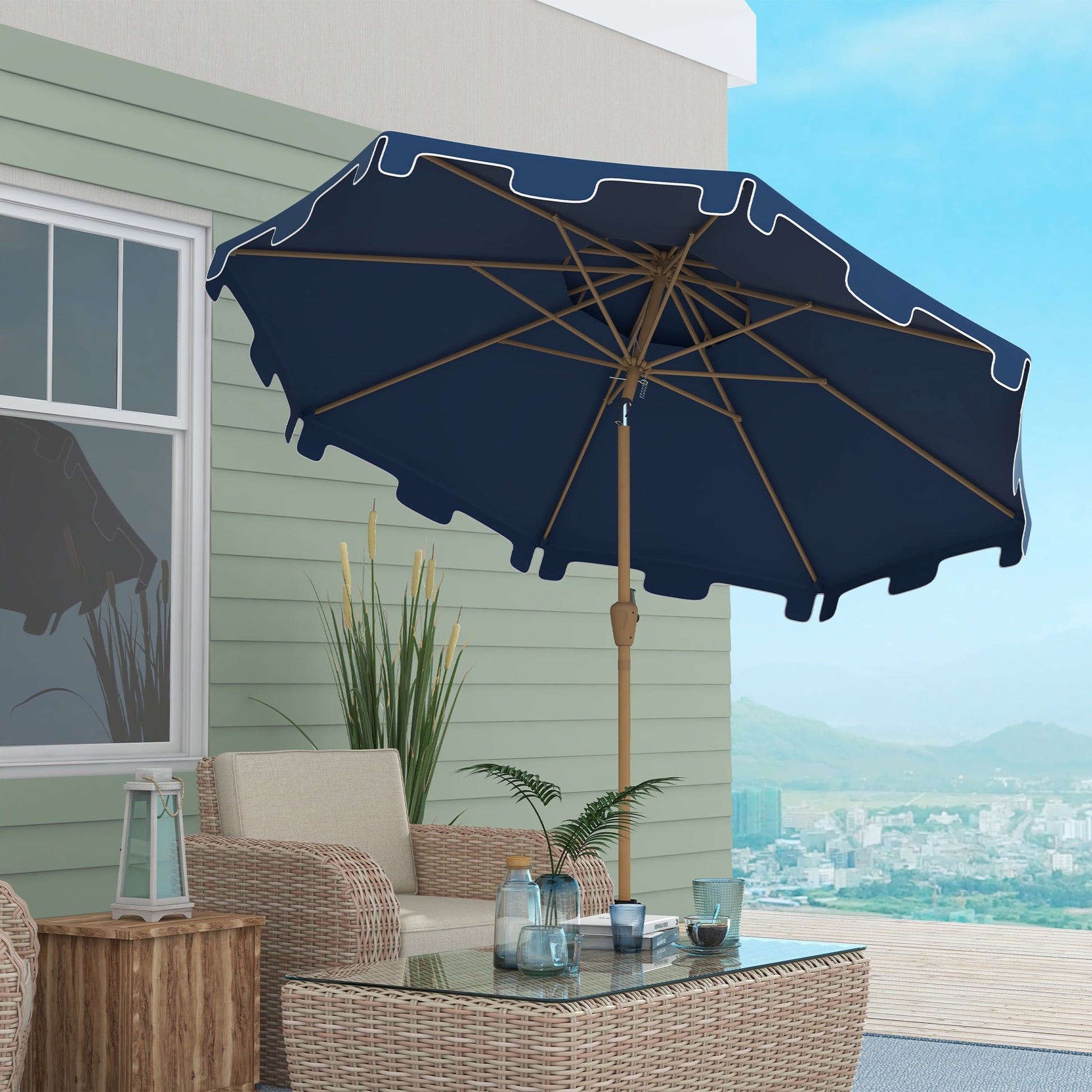 Navy blue patio umbrella with white scalloped trim and wooden pole providing shade