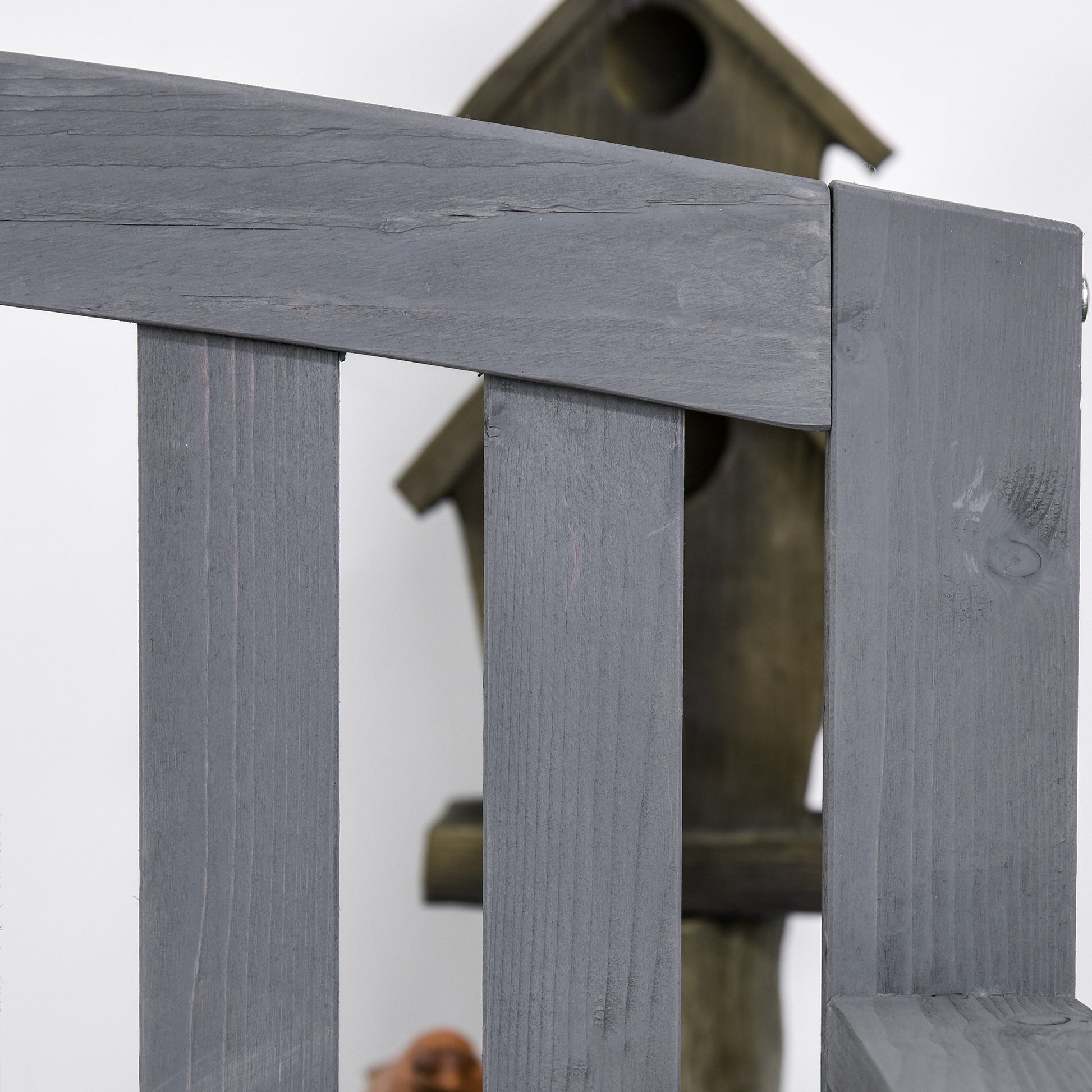Closeup of weathered grey wooden fence planks providing rustic charm