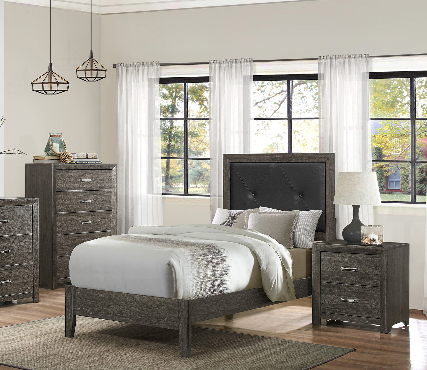Gray wood twin bed with tufted black headboard and matching nightstand
