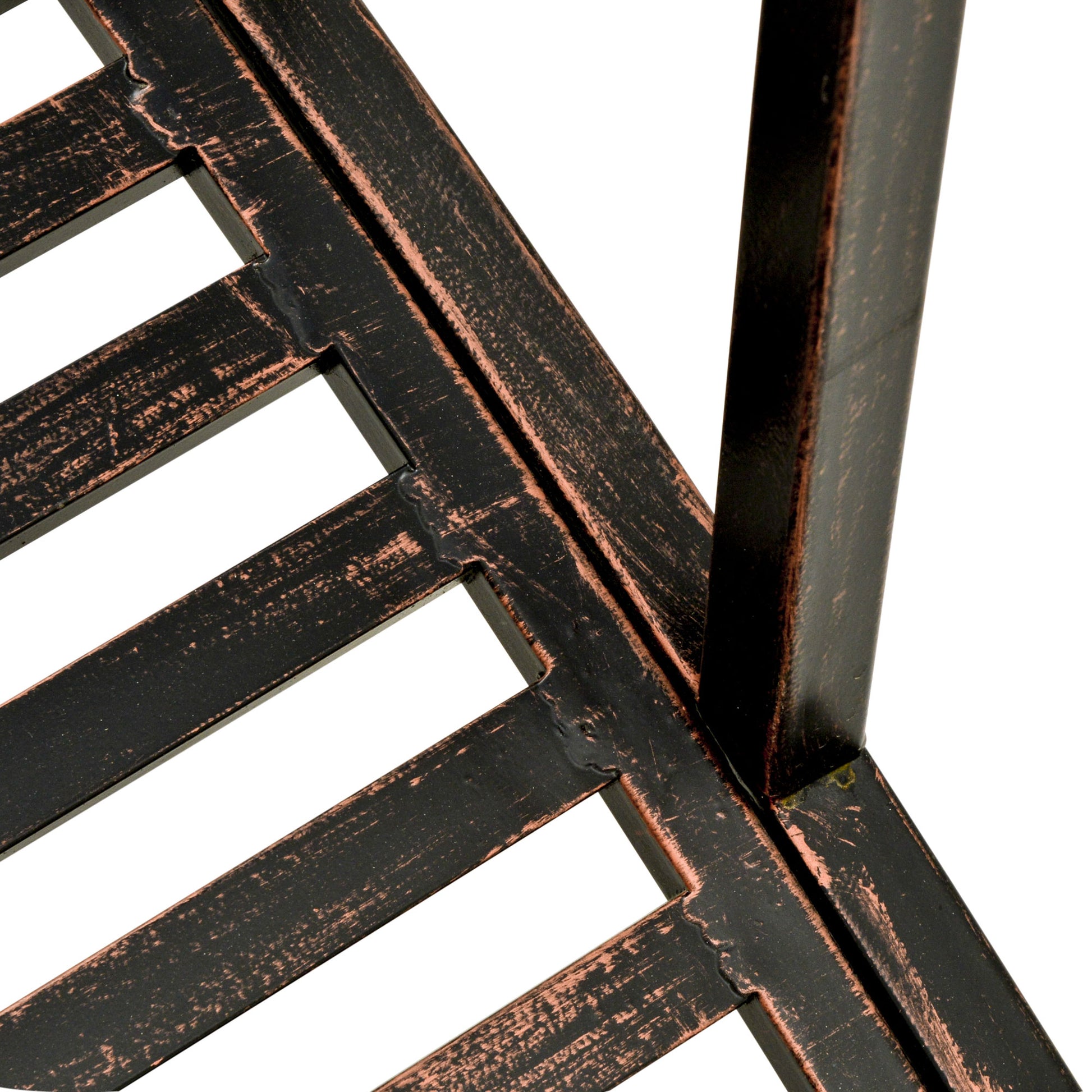 Textured black metal bench frame with copper patina accents