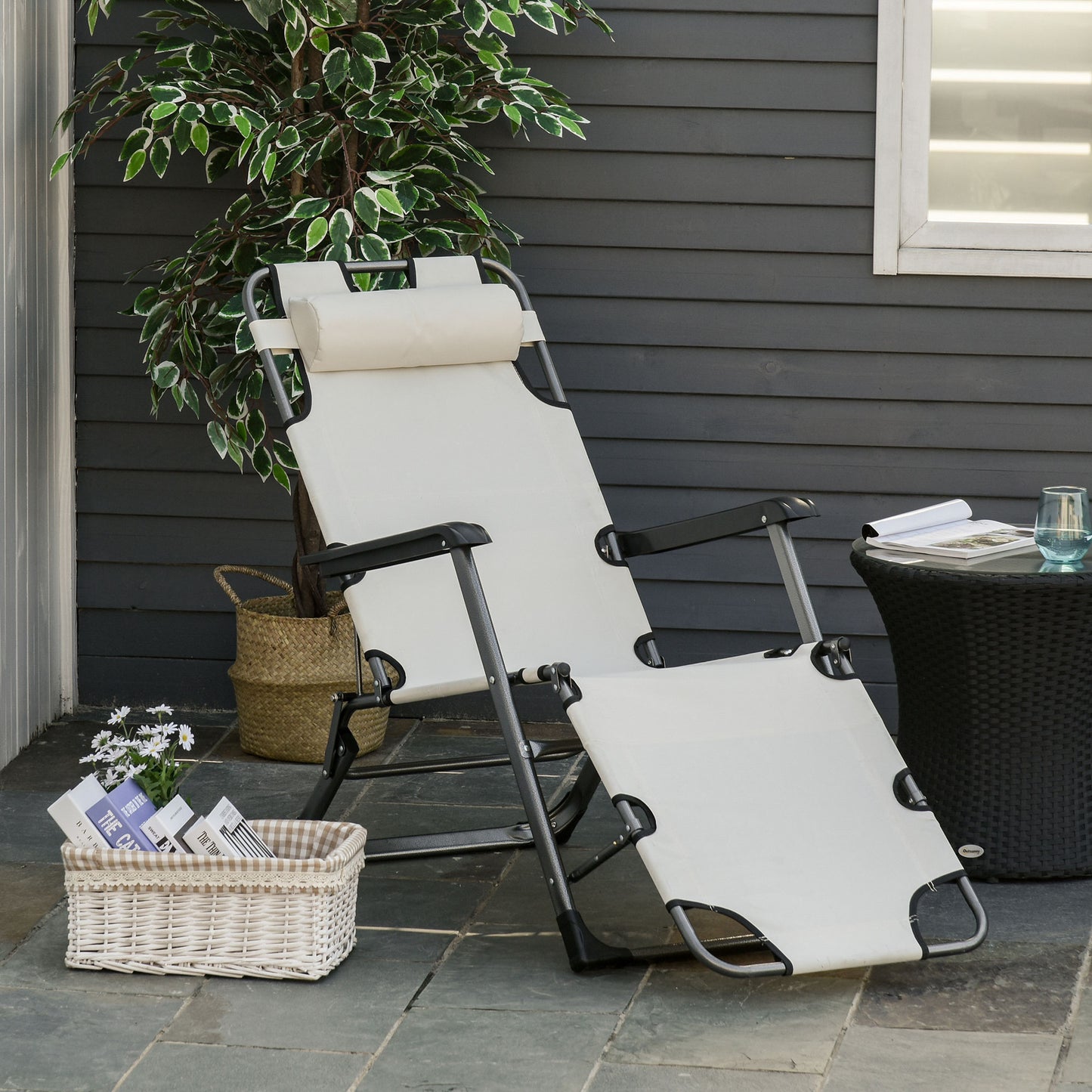 Adjustable zero gravity recliner in beige with padded headrest for ultimate relaxation