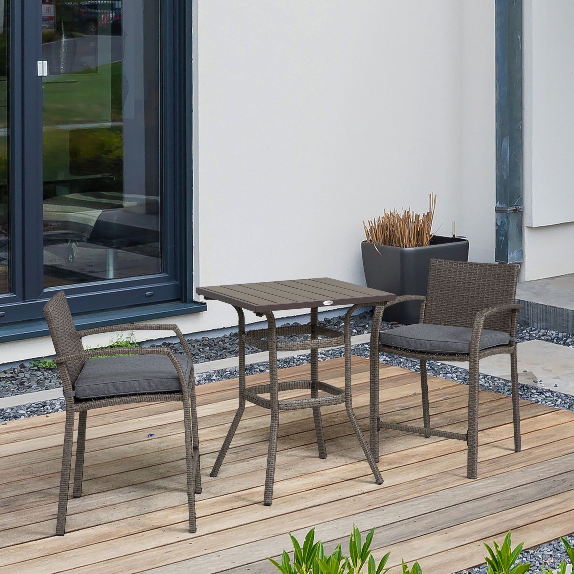Brown rattan bar table set with grey cushions ideal for outdoor patio dining