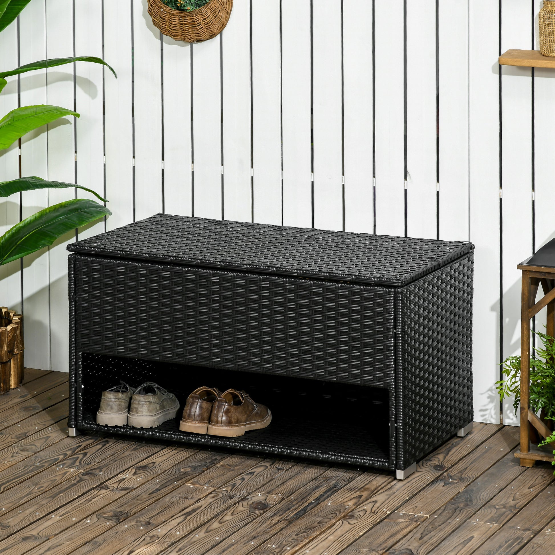 Black rattan storage bench with shoe rack perfect for outdoor patios