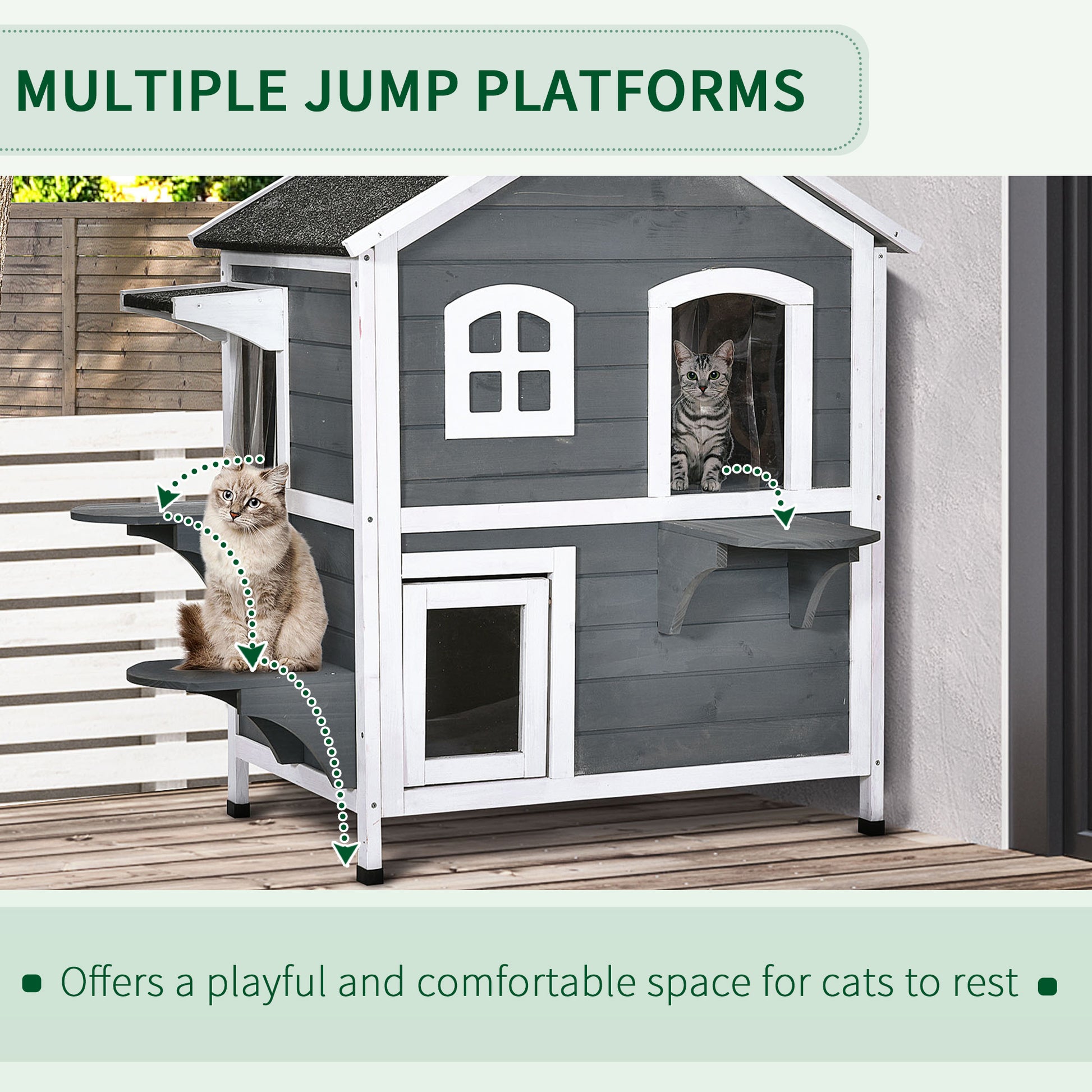 Gray wooden multilevel cat condo with two cats enjoying jump platforms