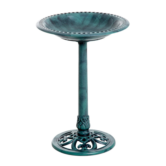 Ornate antique green cast iron bird bath with scalloped edge and pedestal base for garden decor