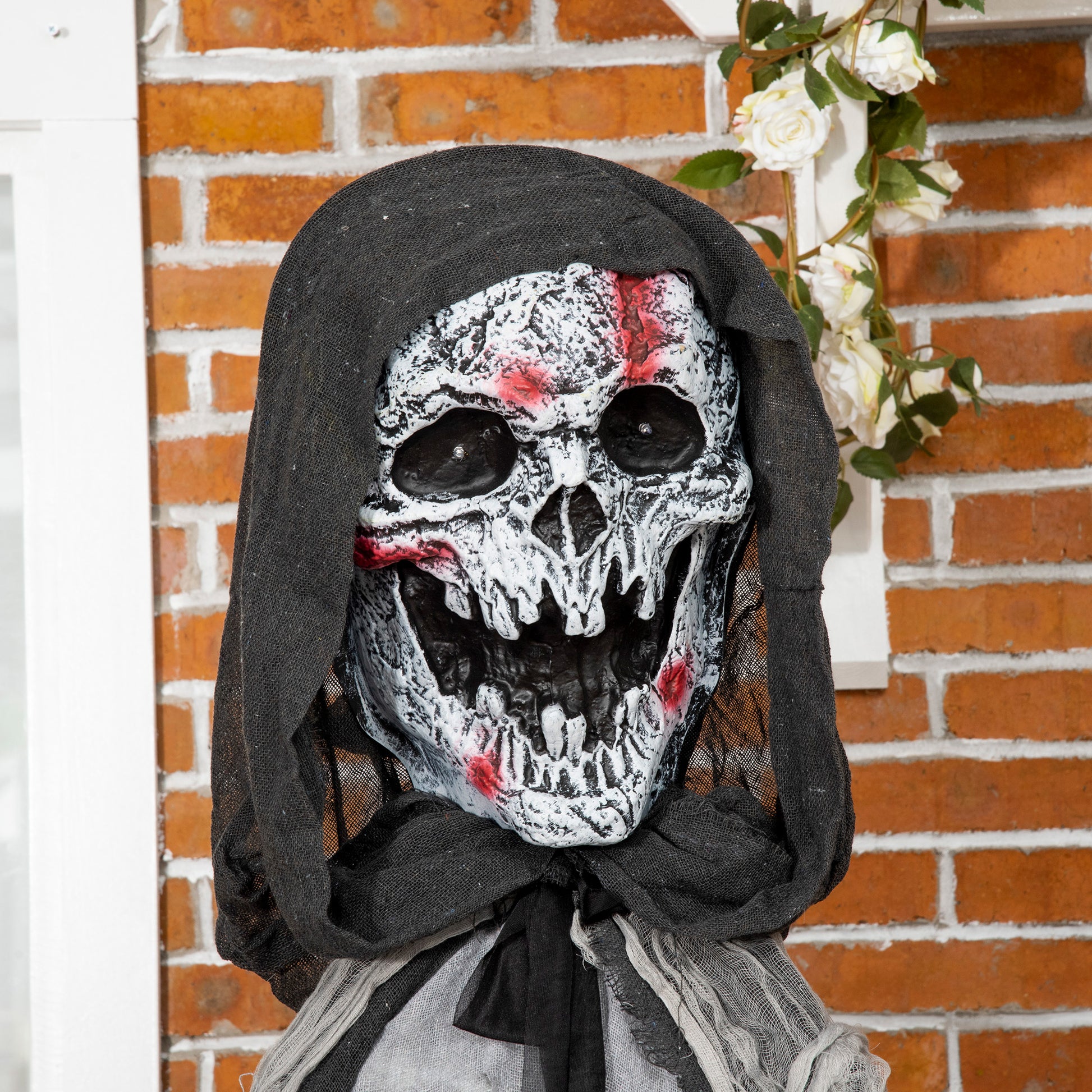 Scary Halloween grim reaper mask with black hood and blood splatter  characters