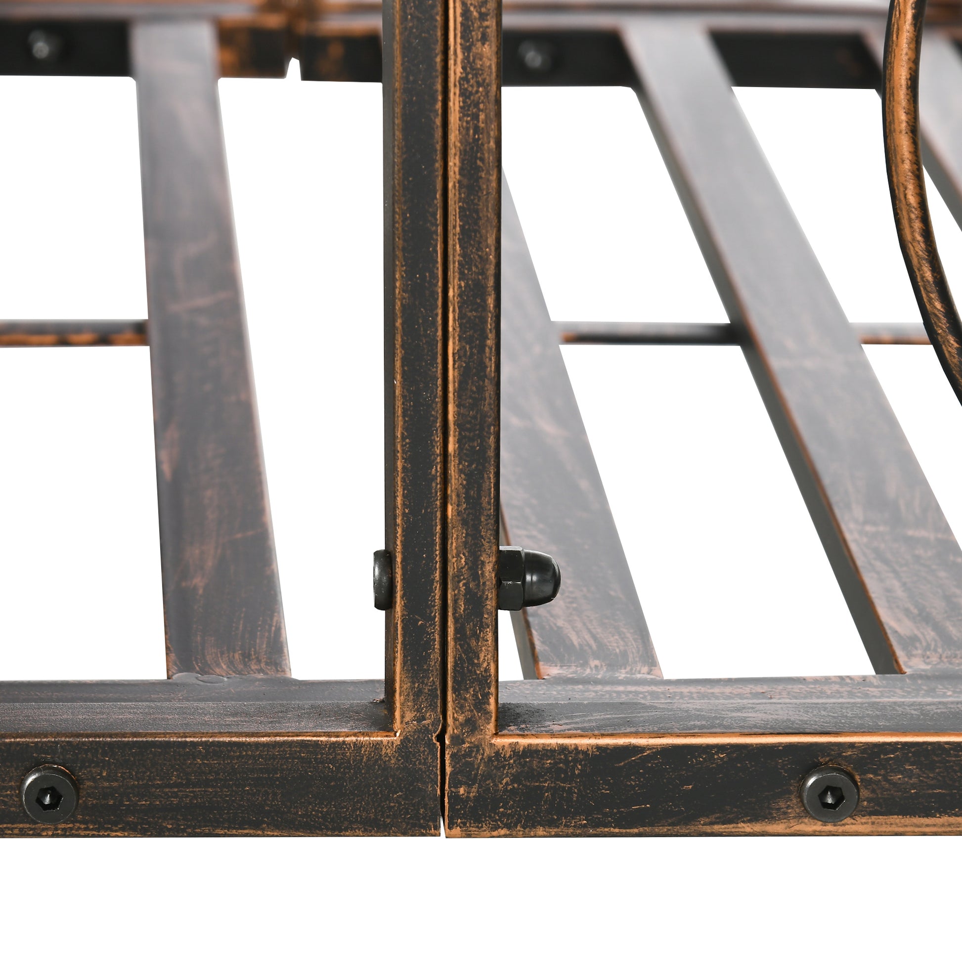 Bronze metal bed frame with slatted support closeup view