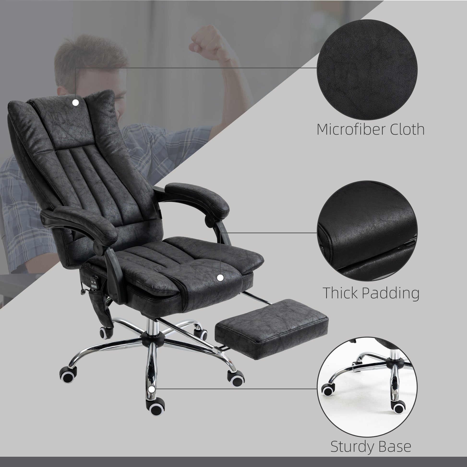 Black executive office chair with microfiber cloth upholstery and retractable footrest