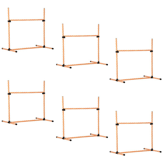 Set of  orange and white striped dog agility hurdles with sturdy black bases