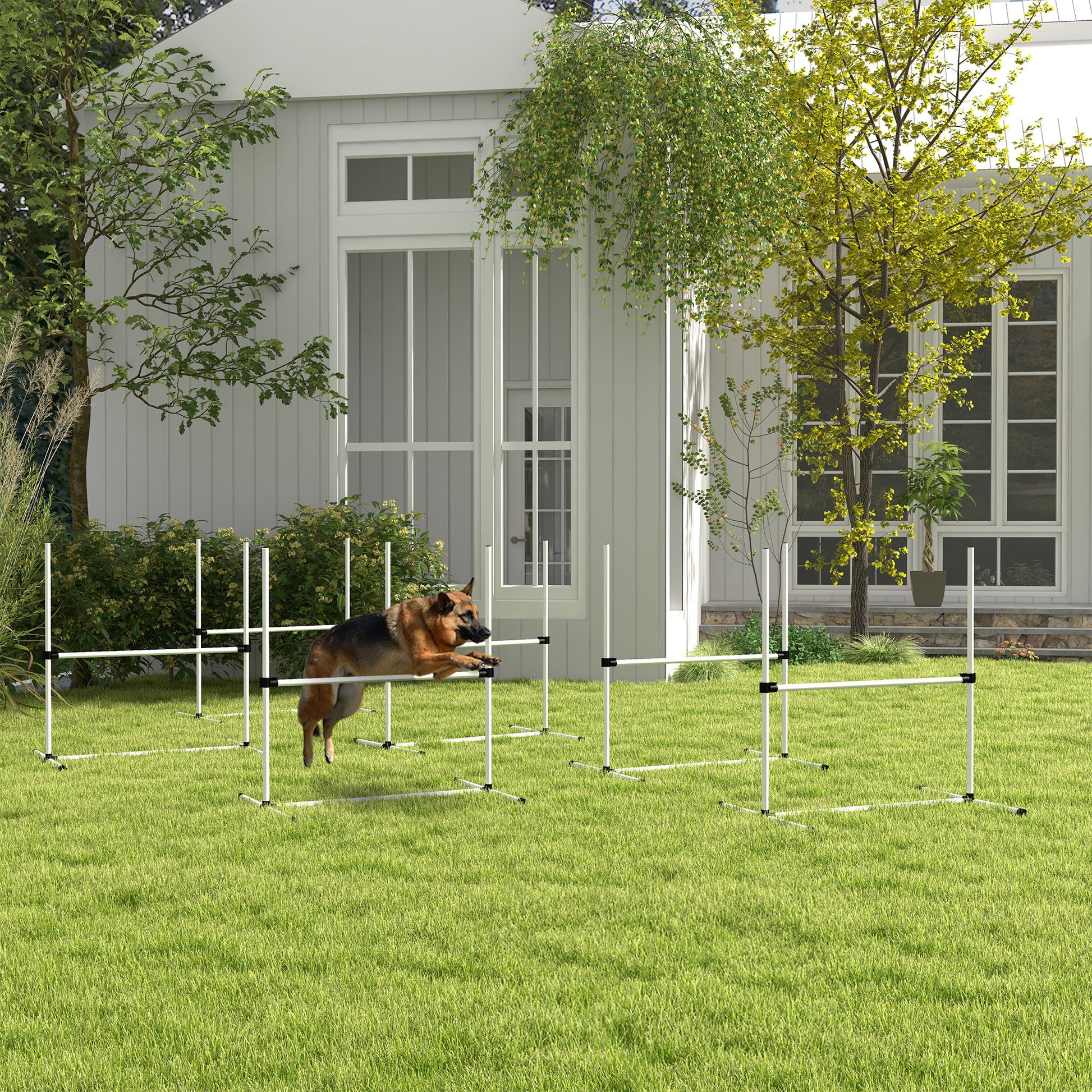 German Shepherd jumping over agility hurdle in backyard training setup