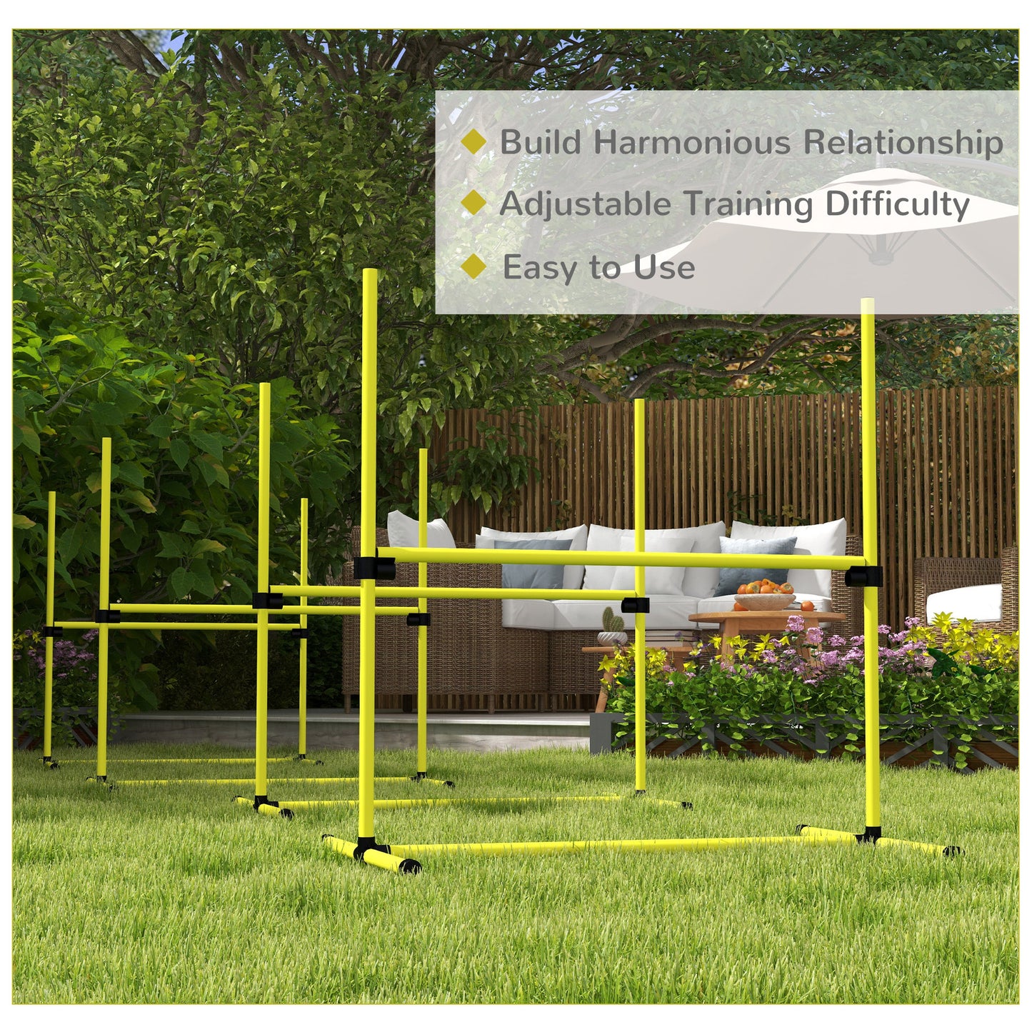 Yellow agility poles set up for dog training on a grassy lawn
