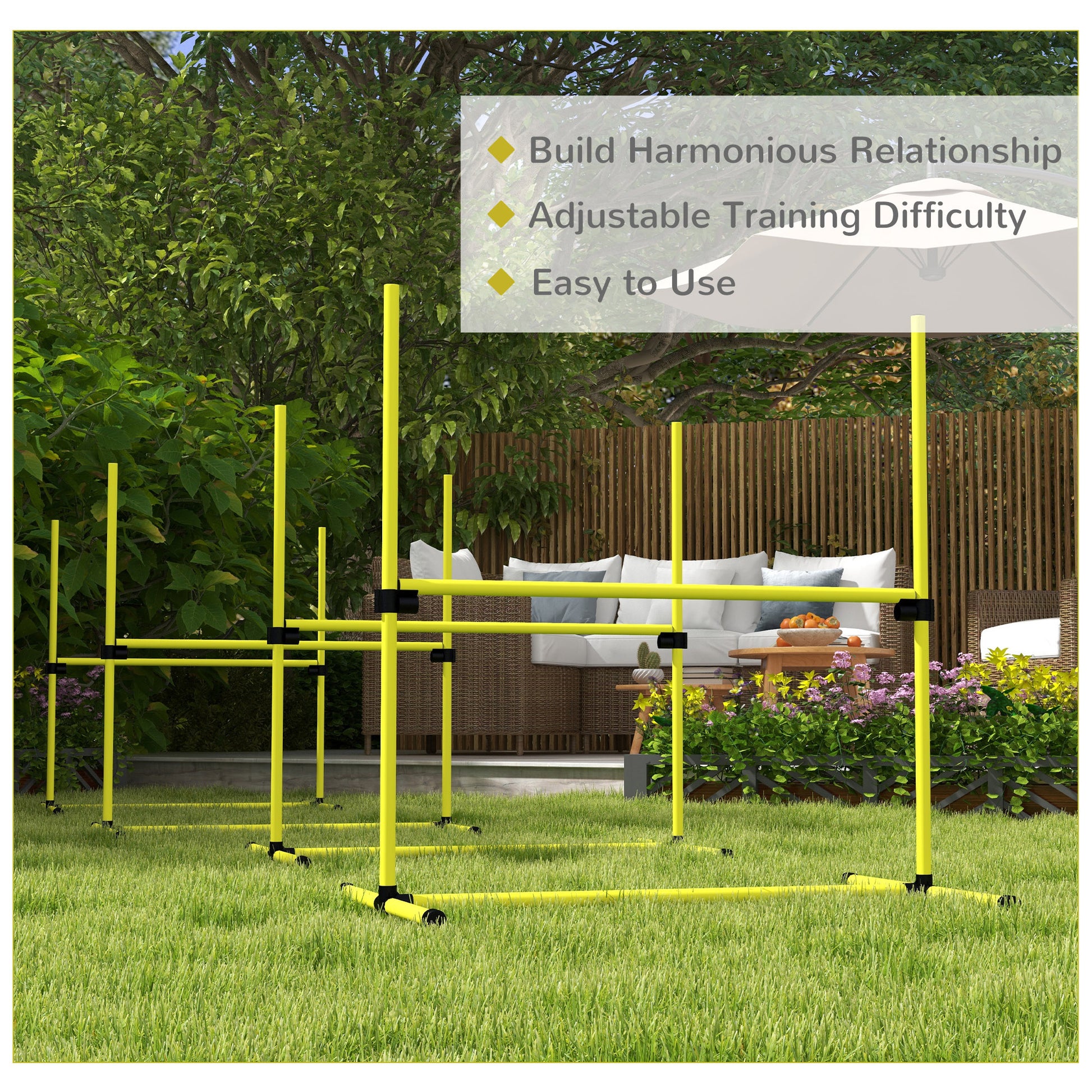 Yellow agility poles set up for dog training on a grassy lawn